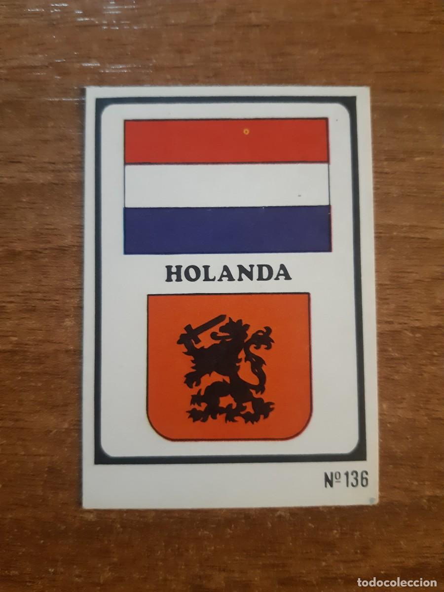 Football Stickers: N&deg;136 Escudo y Bandera Holanda Mundial Munich 74 Ed. RU&Iacute;Z ROMERO 1974. Nunca pegado, sin pegar