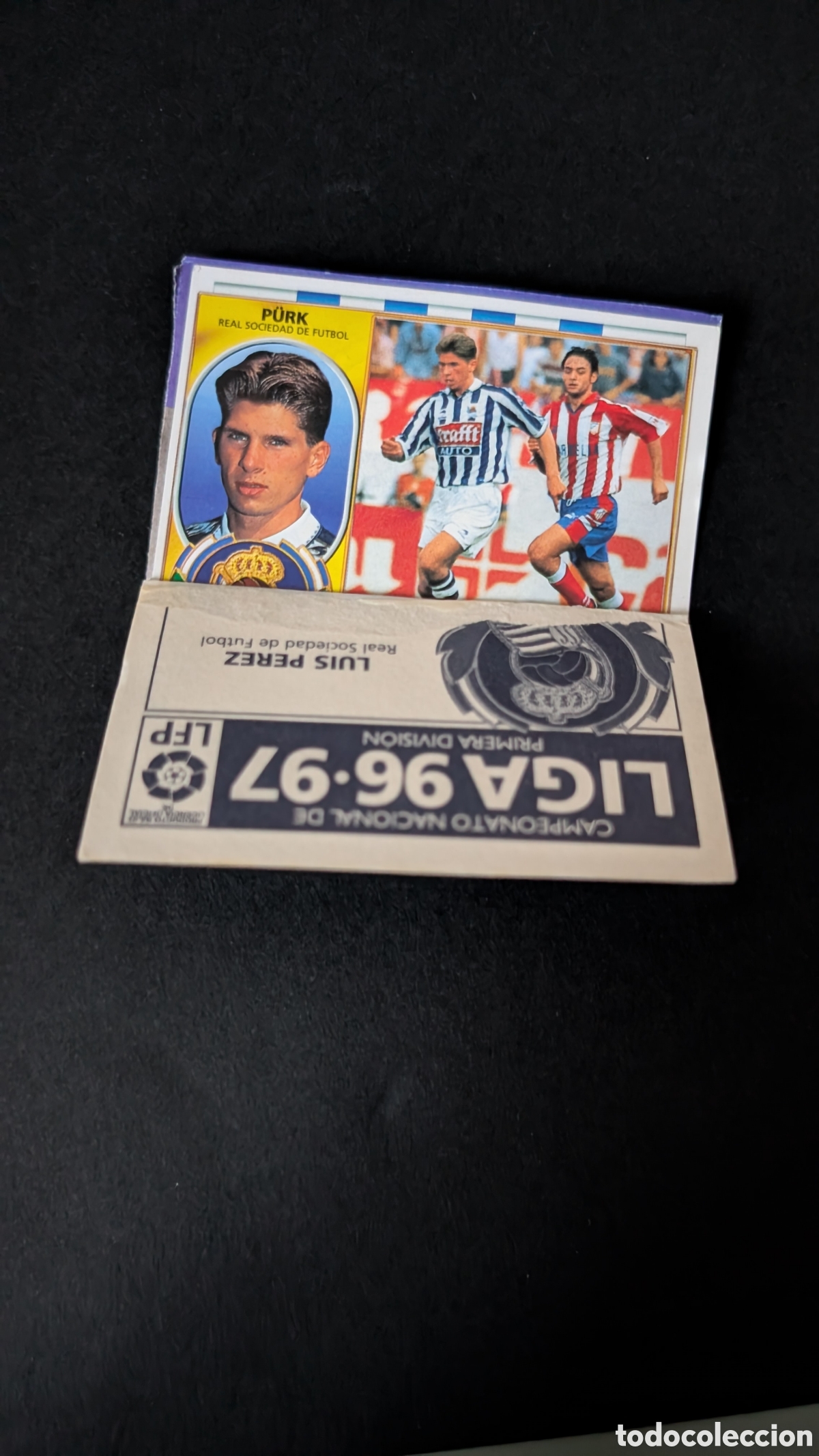 Cromos de F&uacute;tbol: PURK REAL SOCIEDAD BAJA CON CROMO ENCIMA LIGA ESTE 1996/97 96 97 RECORTADO