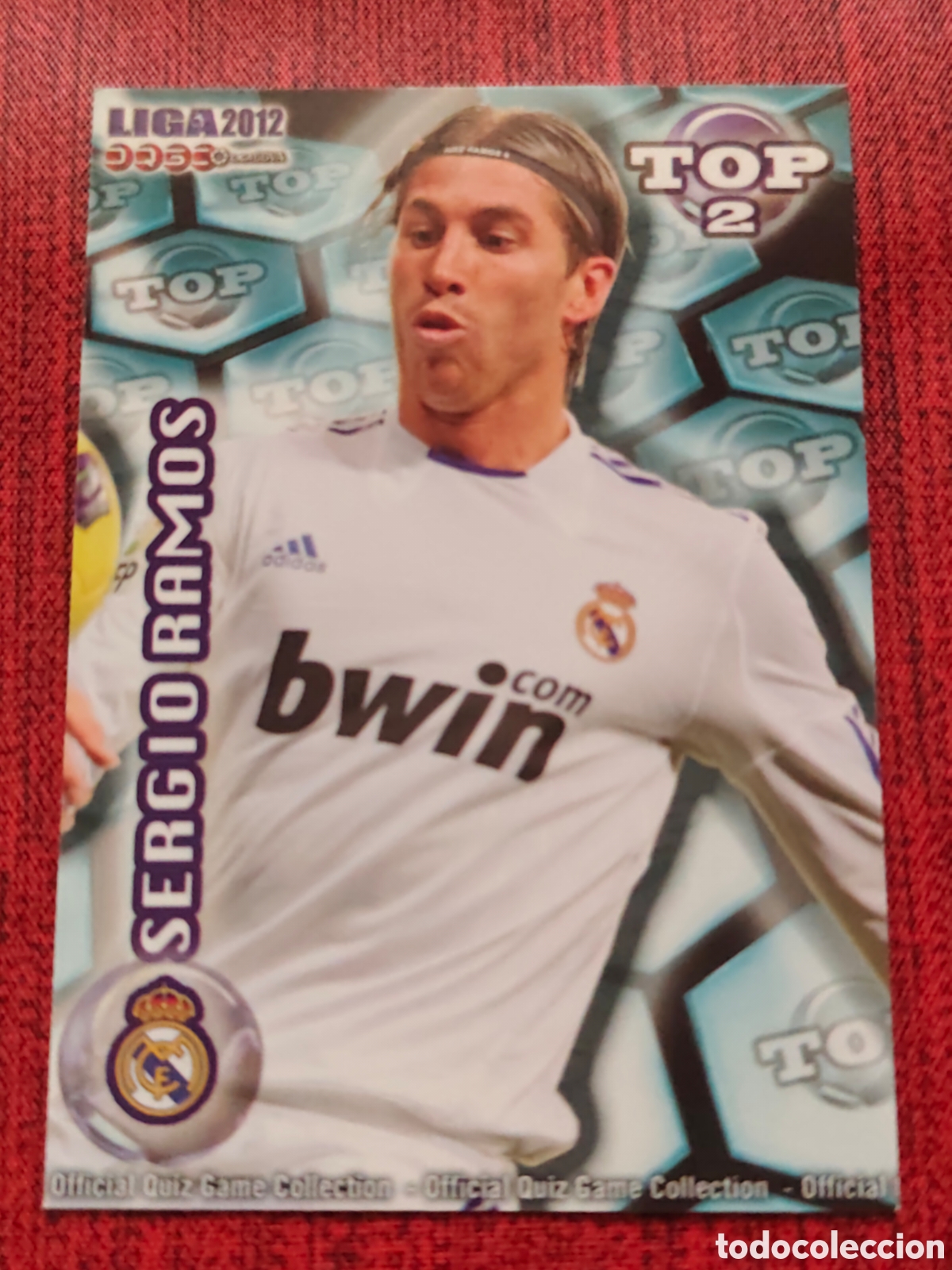 Cromos de F&uacute;tbol: 551 SERGIO RAMOS REAL MADRID TOP AZUL MATE MUNDICROMO QUIZ GAME 2011 2012