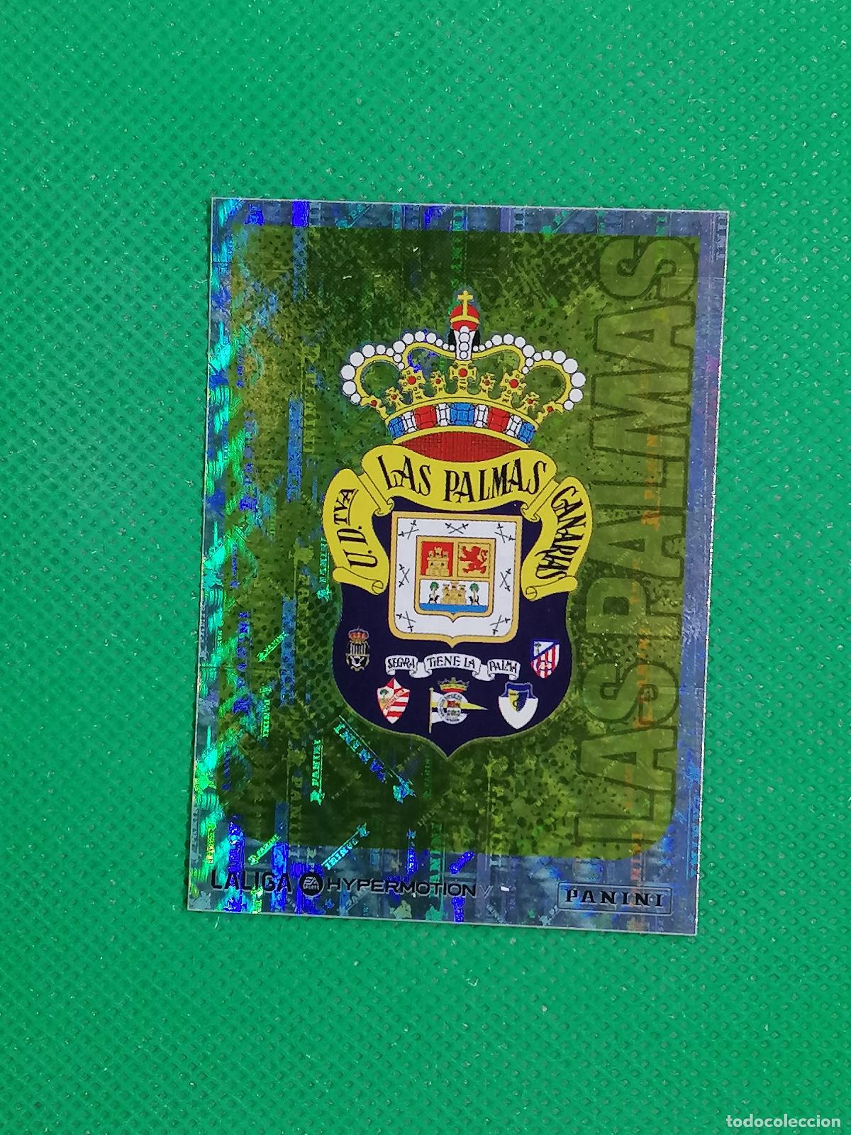 Cartes &agrave; collectionner de Football: 249 ESCUDO LAS PALMAS ⚽ PANINI LIGA HYPERMOTION 25 26 2025 2026 ⚽