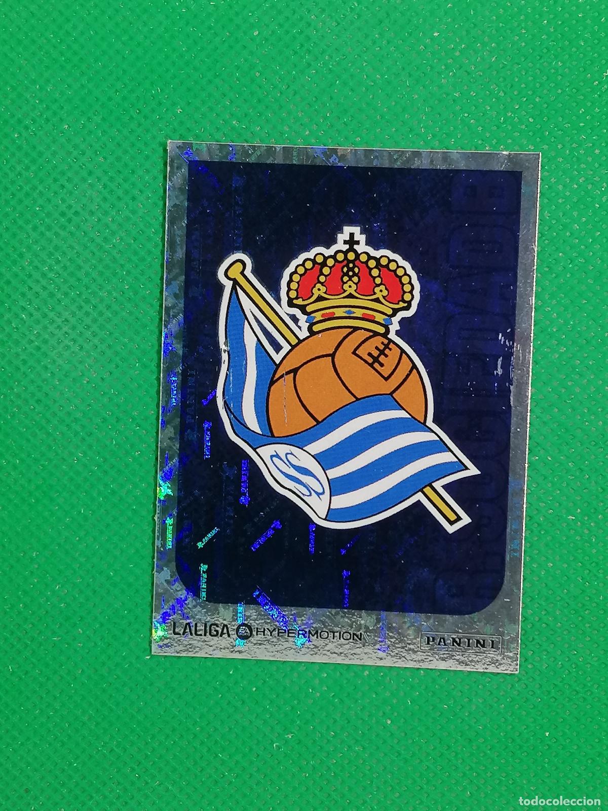 Cromos de F&uacute;tbol: 344 ESCUDO REAL SOCIEDAD B ⚽ PANINI LIGA HYPERMOTION 25 26 2025 2026 ⚽