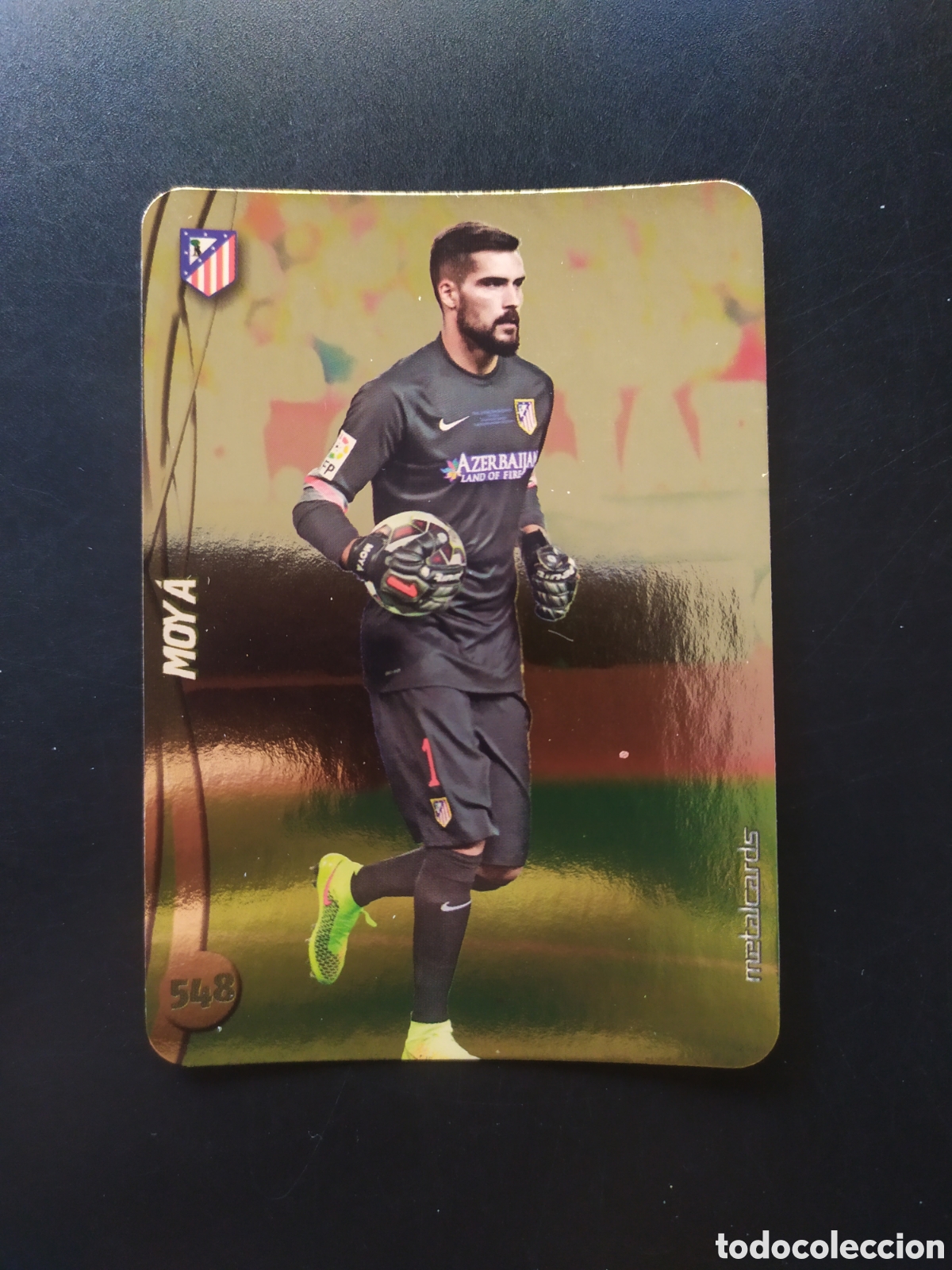 Cromos de F&uacute;tbol: Mundicromo fichas Liga 2014 2015 14 15 Moya top brillo liso dorado n&deg; 548 Atl&eacute;tico Madrid