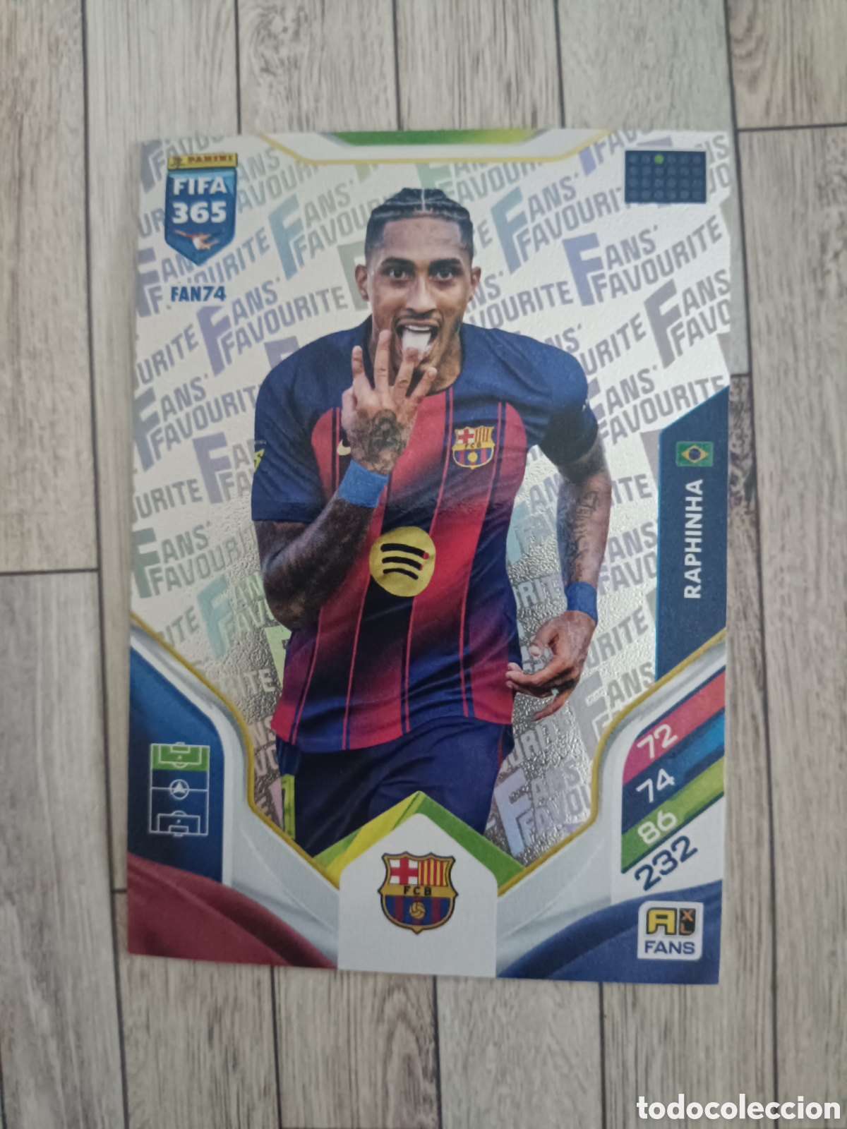Cromos de F&uacute;tbol: FAN74 RAPHINHA BARCELONA FANS' FAVOURITE ADRENALYN XL FIFA 365 PANINI 2026