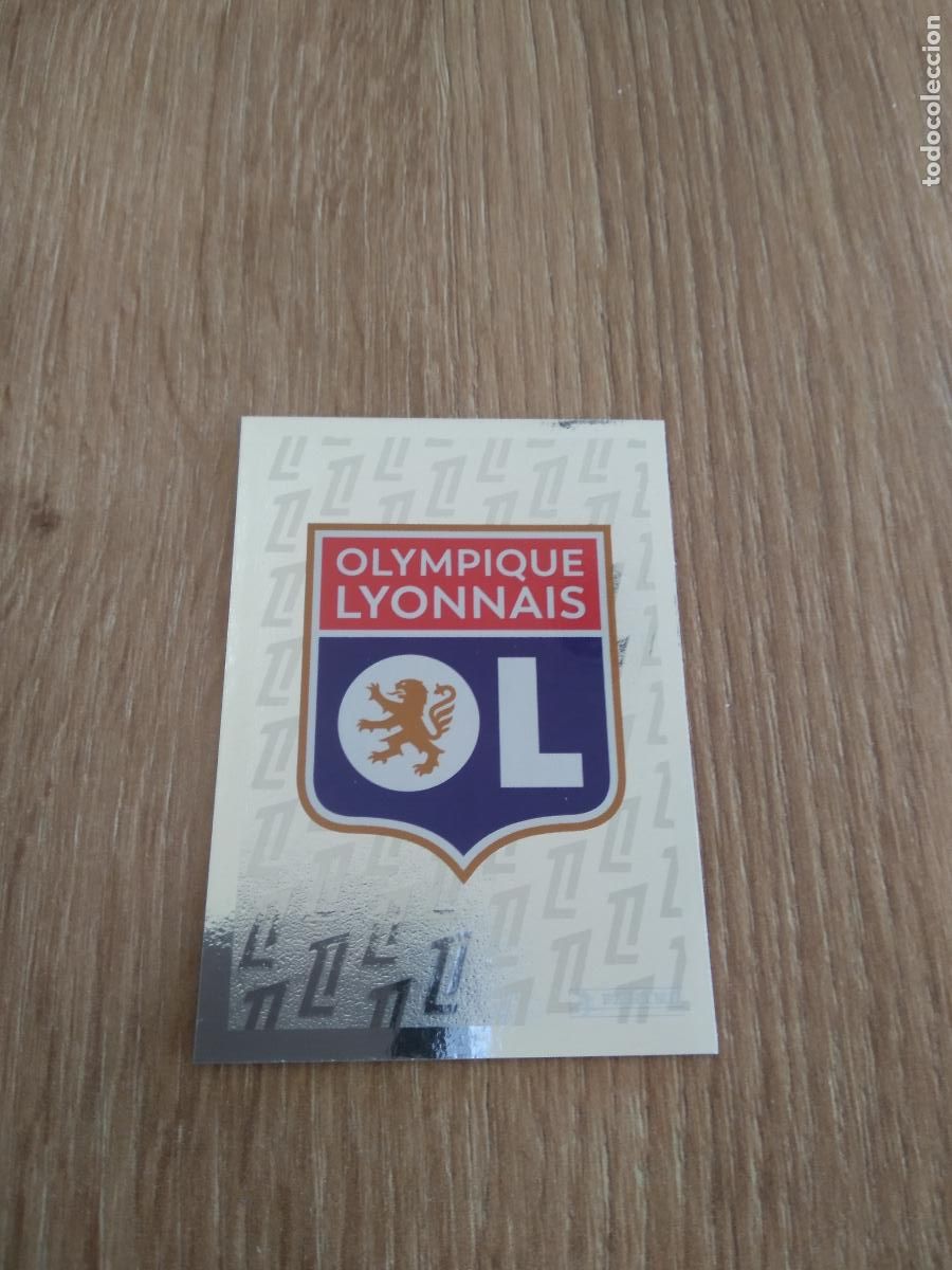 Cromos de F&uacute;tbol: 179 ESCUDO OLYMPIQUE LYON CROMO FUTBOL PANINI LIGUE 1 FOOT 24-25 LIGA FRANCIA 2024-2025