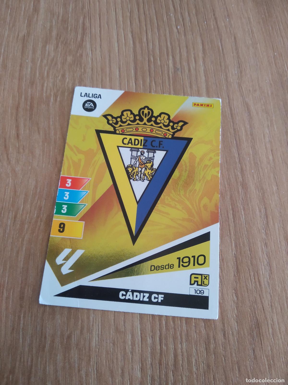 Cromos de F&uacute;tbol: 109 ESCUDO CADIZ CROMO FUTBOL PANINI LIGA 23-24 ADRENALYN 2023-2024