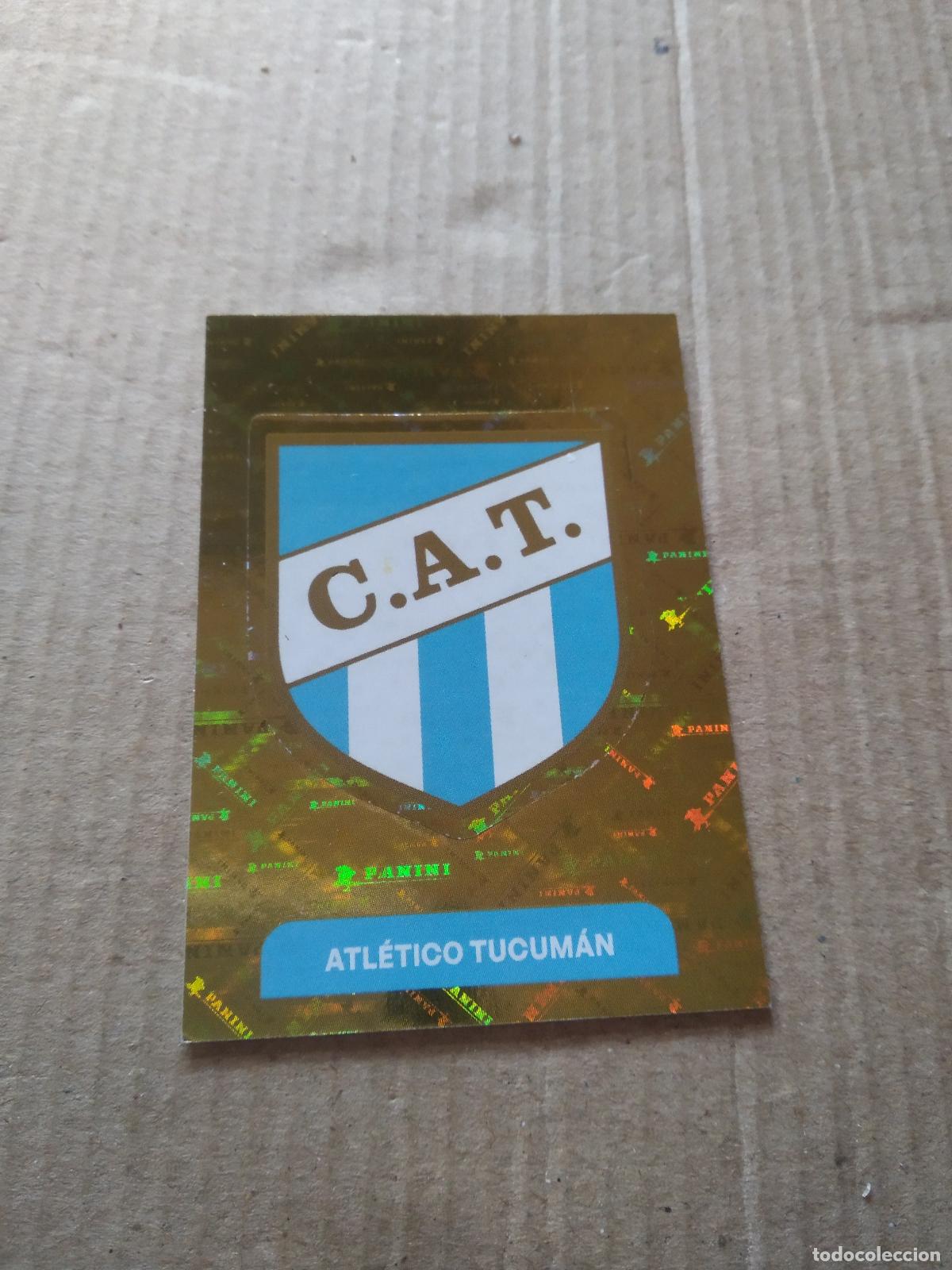 Cromos de F&uacute;tbol: ATU1 ESCUDO ATLETICO TUCUMAN CROMO FUTBOL ARGENTINO PANINI LIGA ARGENTINA 2025