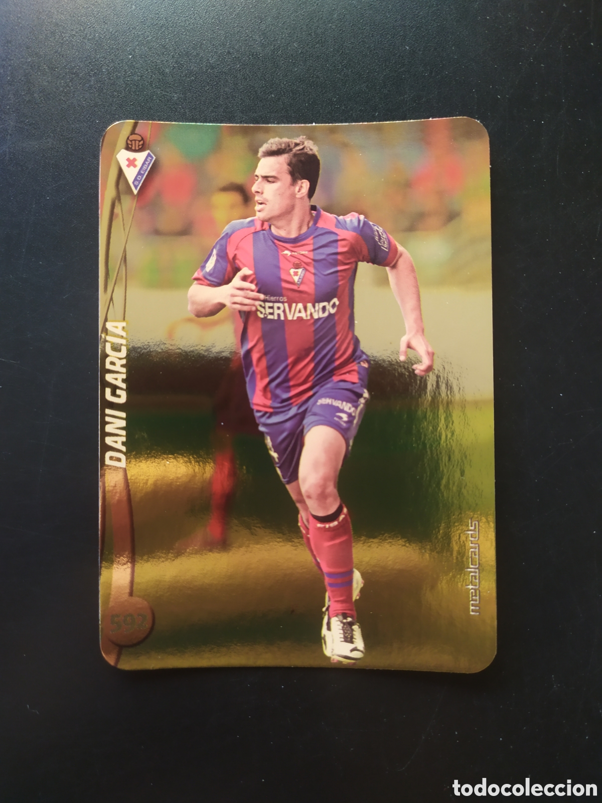 Cromos de F&uacute;tbol: Mundicromo fichas Liga 2014 2015 14 15 Dani Garc&iacute;a top brillo liso dorado n&deg; 592 Eibar