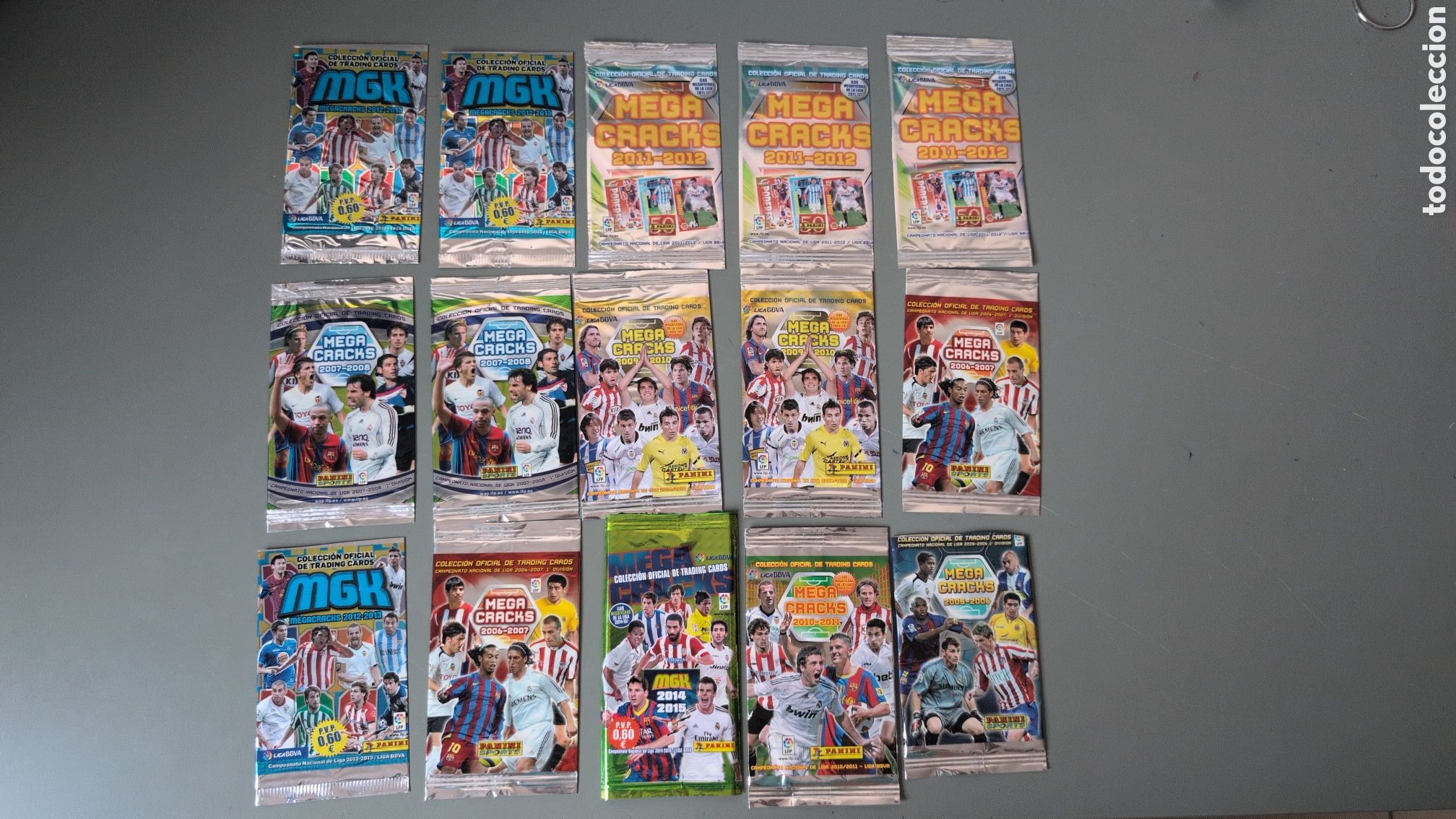 Cromos de F&uacute;tbol: LOTE 15 SOBRES VACIOS ABIERTOS MEGACRACKS ENTRE 2005 Y 2014 BUEN ESTADO