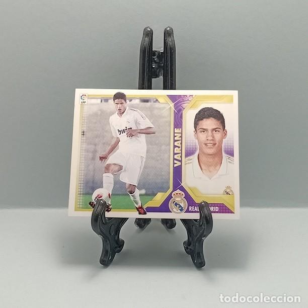 Cromos de F&uacute;tbol: 5 B VARANE REAL MADRID CF CROMO LIGA EDICIONES ESTE 2011-12 2011 2012 11 12 COLOCA 2&ordf; EDICI&Oacute;N NUEVO