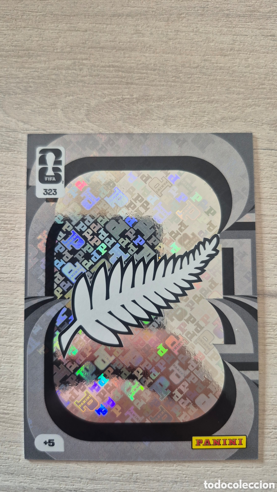 Cromos de F&uacute;tbol: N&deg;323 Escudo Nueva Zelanda Adrenalyn FIFA World Cup 26