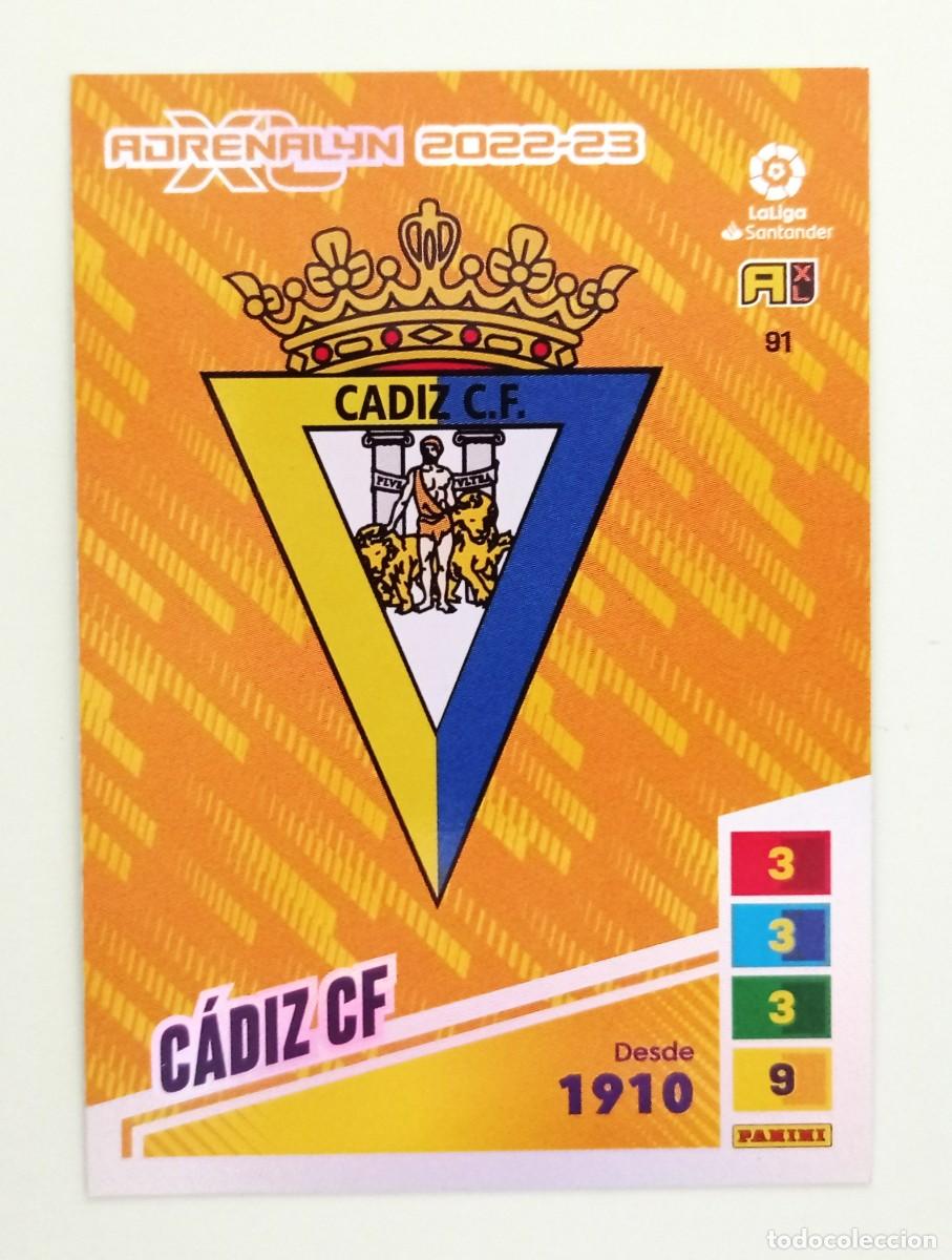 Fu&szlig;ball-Sticker: ADRENALYN XL 2022-2023 (N&ordm; 91 ESCUDO - C&Aacute;DIZ C.F.)