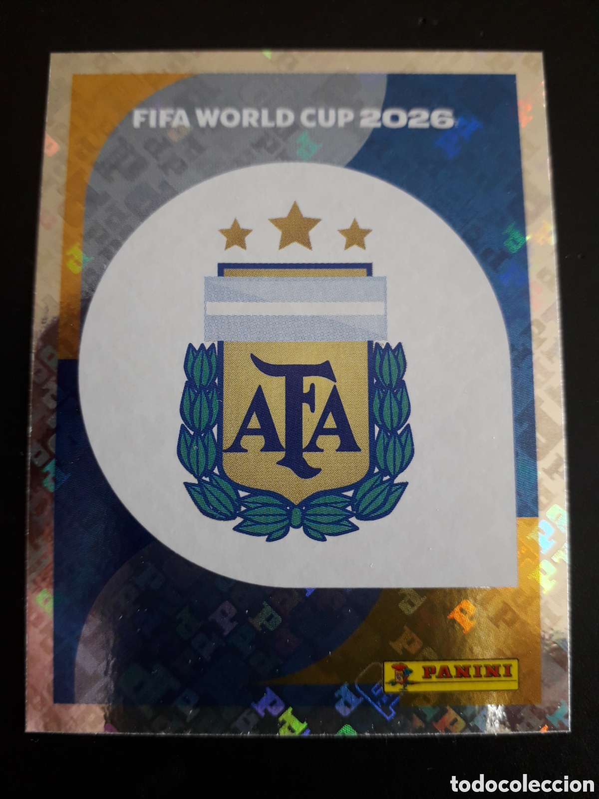 Fu&szlig;ball-Sticker: ESCUDO ARGENTINA ARG 1 MUNDIAL F&Uacute;TBOL 2026 FIFA WORLD CUP PANINI SIN PEGAR PEDIDO M&Iacute;NIMO 3&euro;