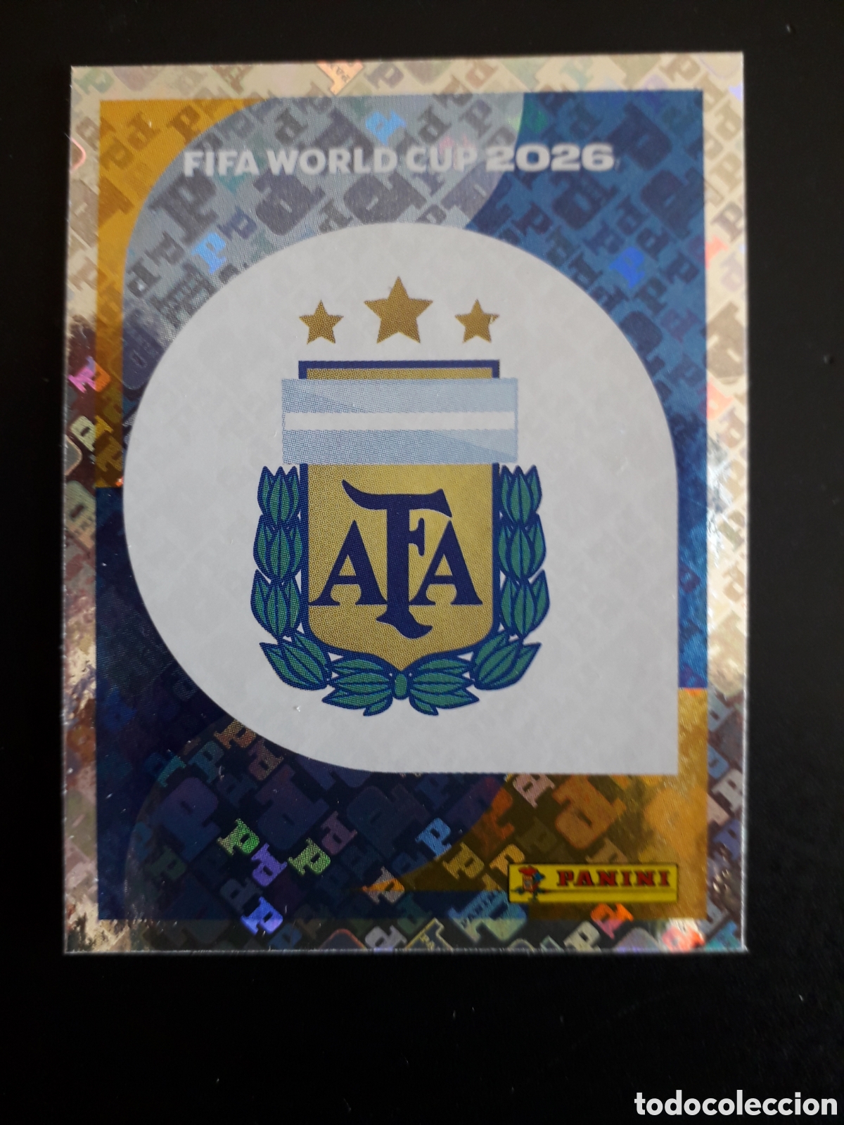 Cartes &agrave; collectionner de Football: ESCUDO ARGENTINA ARG 1 MUNDIAL F&Uacute;TBOL 2026 FIFA WORLD CUP PANINI SIN PEGAR PEDIDO M&Iacute;NIMO 3&euro;