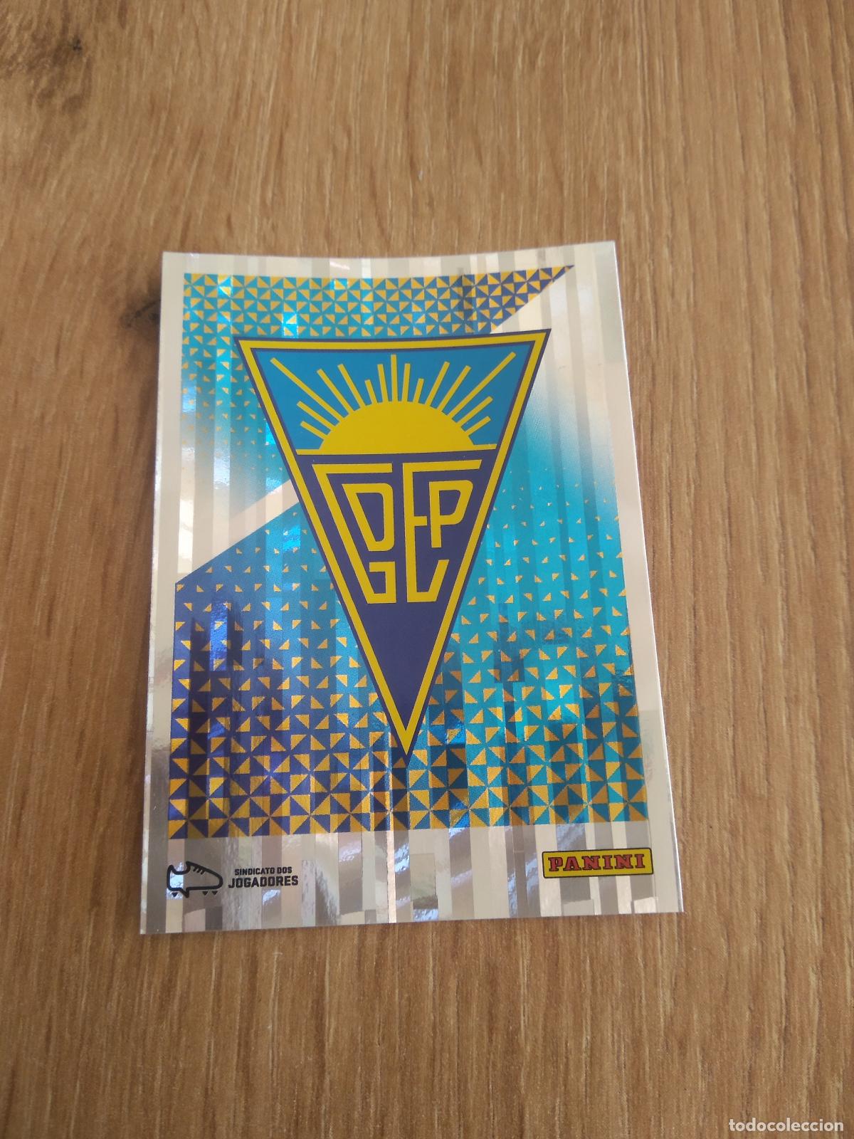 Cromos de F&uacute;tbol: 7 ESCUDO ESTORIL CROMO FUTBOL PANINI LIGA PORTUGAL 25-26 FUTEBOL LIGA BETCLIC 2025-2026