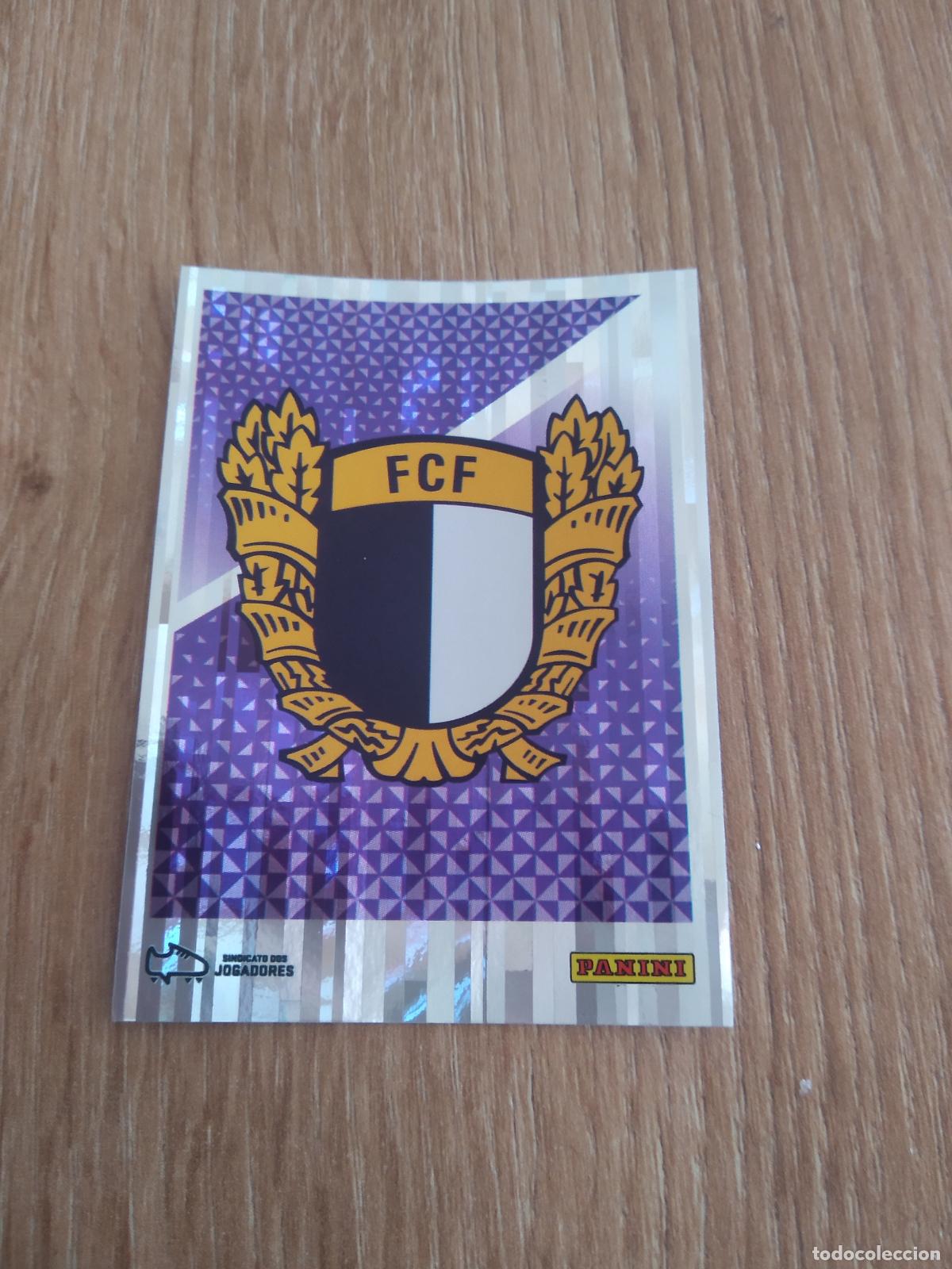 Cromos de F&uacute;tbol: 9 ESCUDO FAMALICAO CROMO FUTBOL PANINI LIGA PORTUGAL 25-26 FUTEBOL LIGA BETCLIC 2025-2026