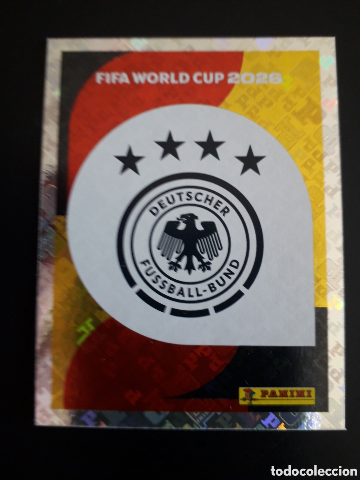 Cromos de F&uacute;tbol: ESCUDO ALEMANIA GER 1 MUNDIAL F&Uacute;TBOL 2026 FIFA WORLD CUP PANINI SIN PEGAR PEDIDO M&Iacute;NIMO 3&euro;