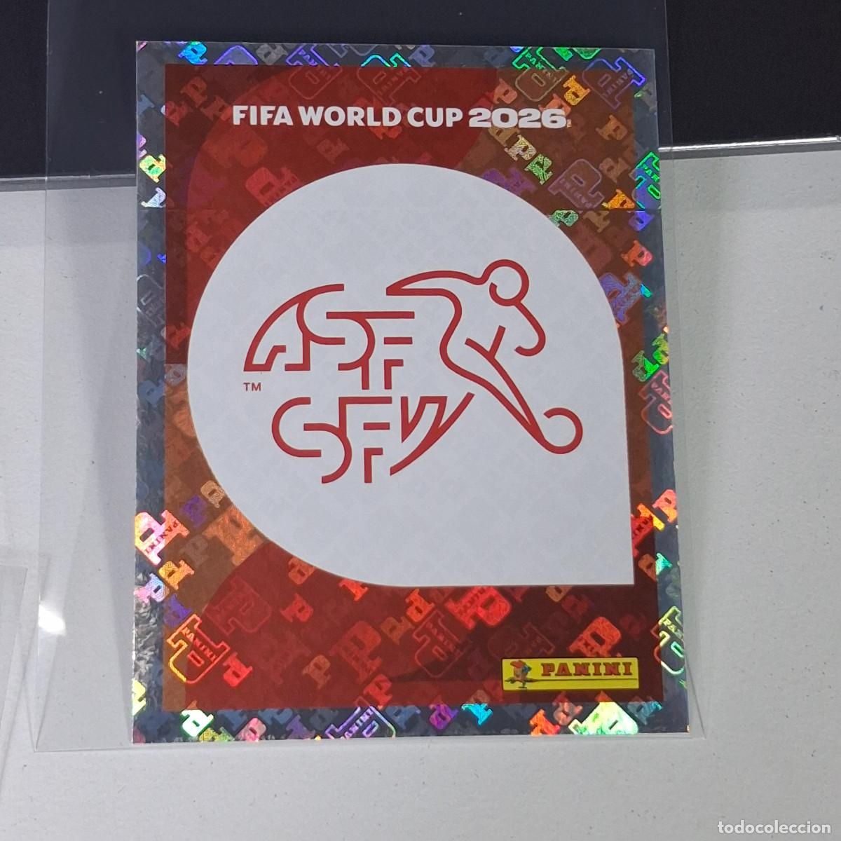 Cartes &agrave; collectionner de Football: A26 SUI 1 SUI1 ESCUDO LOGO BADGE SWITZERLAND SUIZA MUNDIAL FIFA WORLD CUP 2026 STICKER PANINI