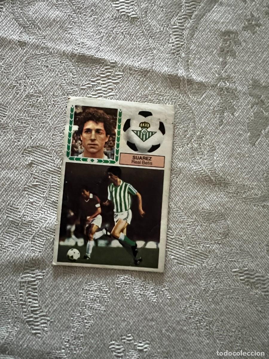 Cromos de F&uacute;tbol: SUAREZ REAL BETIS BALOMPIE FICHAJE 14 VERSION PINTADA LIGA ESTE LIGA FUTBOL 83 84