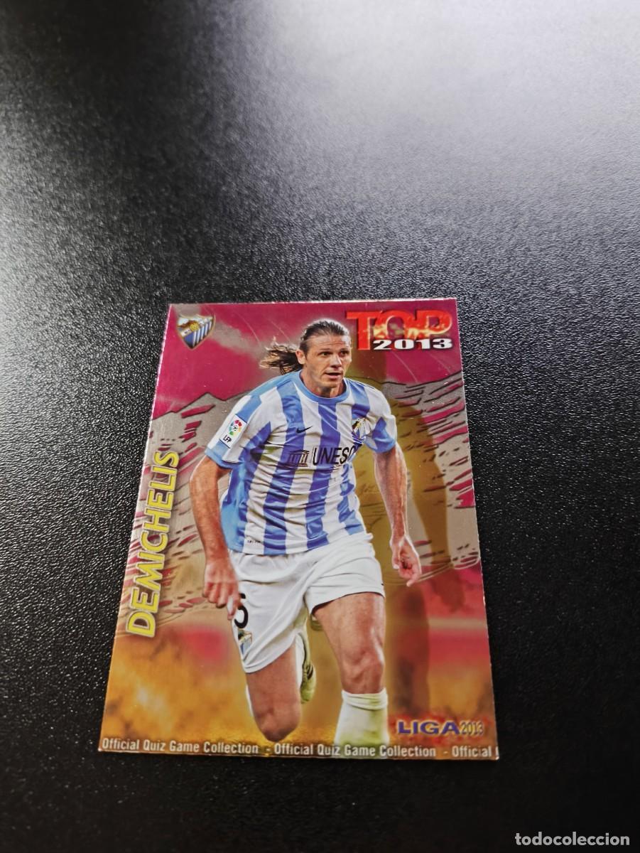 Cromos de F&uacute;tbol: 570 DEMICHELIS MALAGA FONDO FUCSIA ROSA TOP MUNDICROMO LIGA 2012 2013 12 13 NO PANINI ESTE