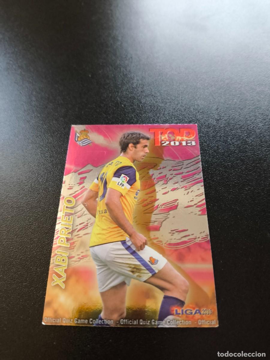 Cromos de F&uacute;tbol: 601 XABI PRIETO REAL SOCIEDAD FONDO FUCSIA ROSA TOP MUNDICROMO LIGA 2012 2013 12 13 NO PANINI ESTE
