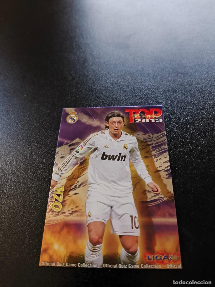 Cromos de F&uacute;tbol: 613 OZIL REAL MADRID FONDO MORADO TOP MUNDICROMO LIGA 2012 2013 12 13 NO PANINI ESTE
