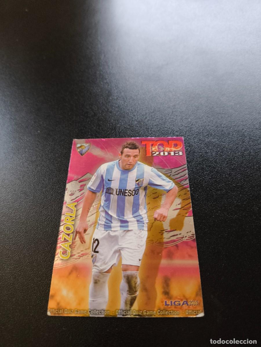 Cromos de F&uacute;tbol: 616 CAZORLA MALAGA FONDO FUCSIA ROSA TOP MUNDICROMO LIGA 2012 2013 12 13 NO PANINI ESTE