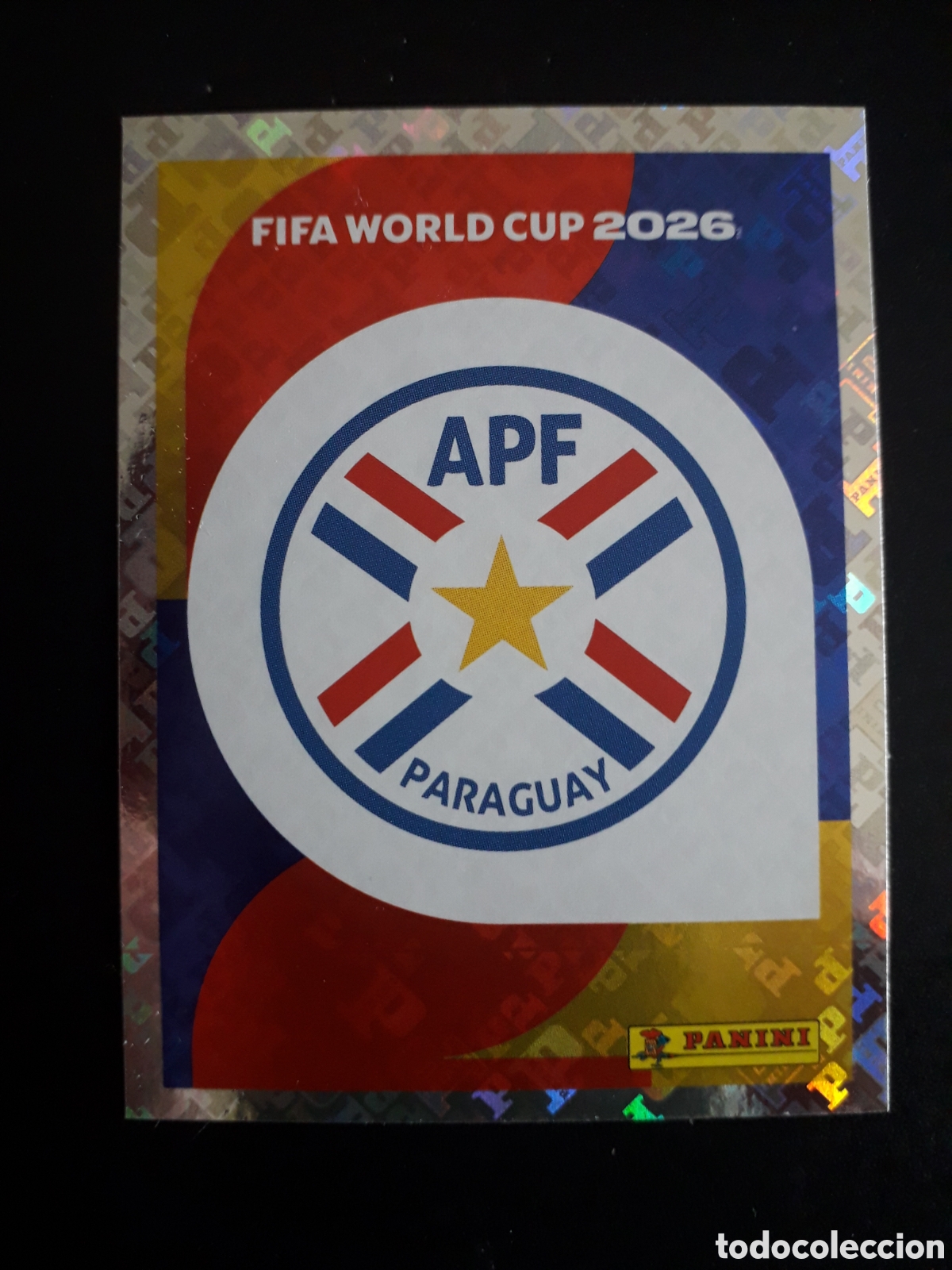 Cromos de F&uacute;tbol: ESCUDO PARAGUAY PAR 1 MUNDIAL F&Uacute;TBOL 2026 FIFA WORLD CUP PANINI SIN PEGAR PEDIDO M&Iacute;NIMO 3&euro;