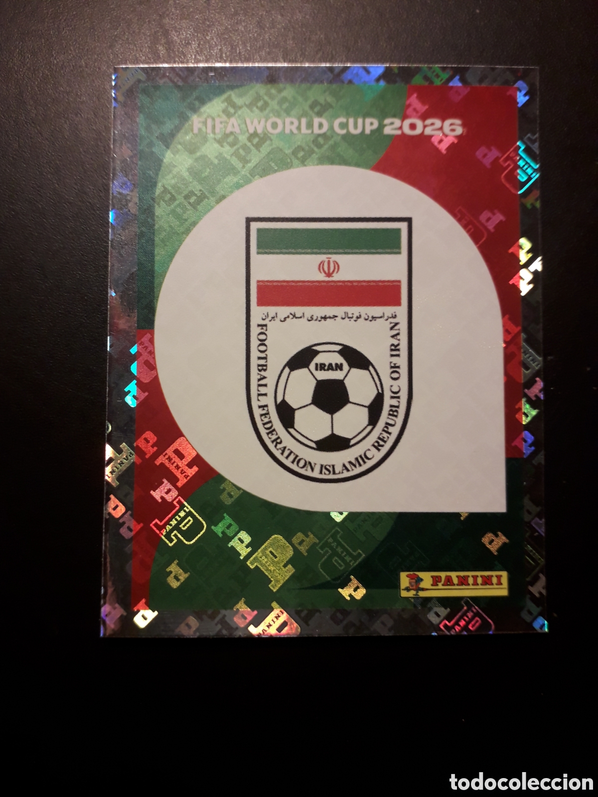 Cromos de F&uacute;tbol: ESCUDO IR&Aacute;N IRN 1 MUNDIAL F&Uacute;TBOL 2026 FIFA WORLD CUP PANINI SIN PEGAR PEDIDO M&Iacute;NIMO 3&euro;.