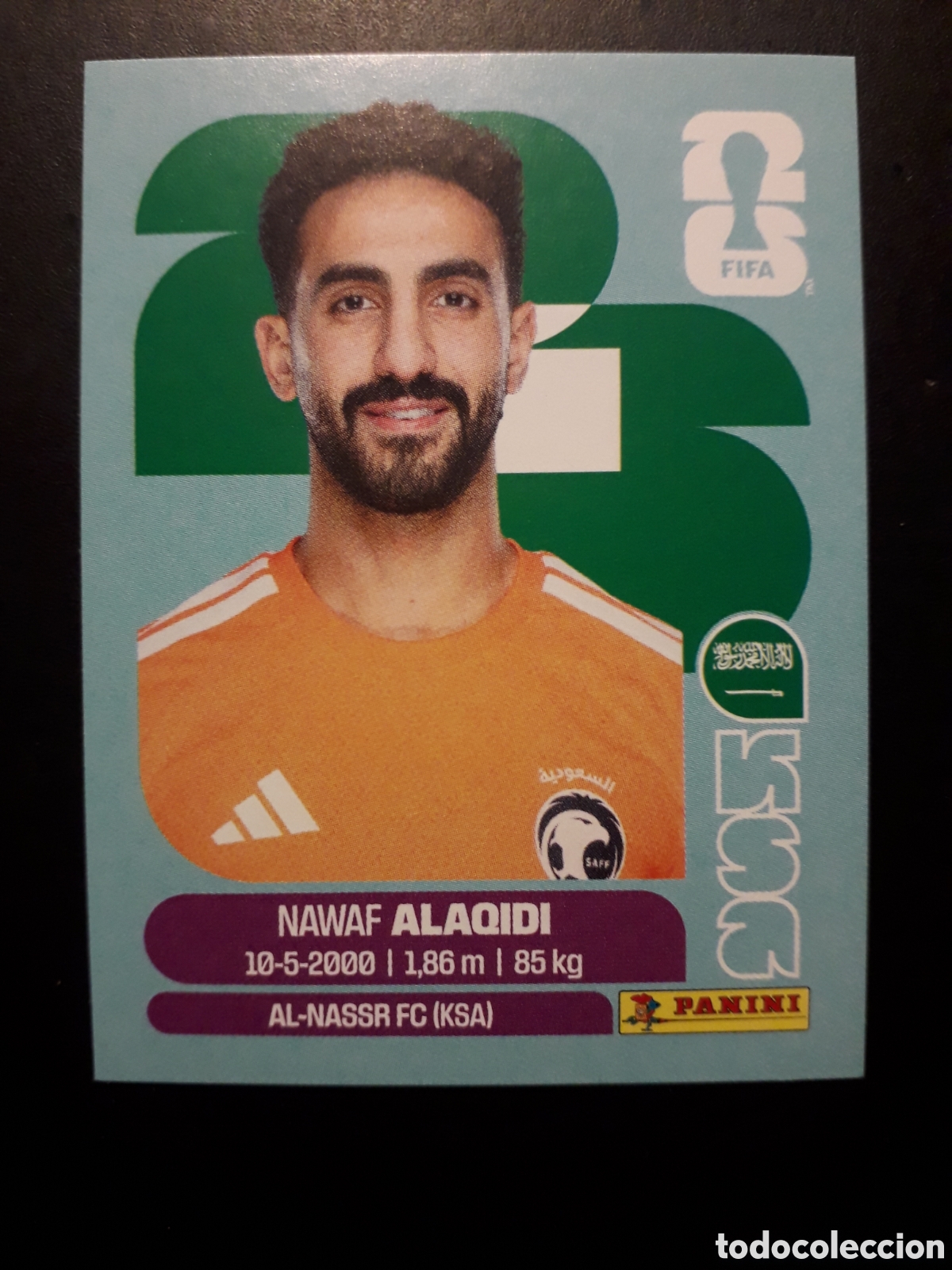 Cromos de F&uacute;tbol: ALAQIDI ARABIA SAUD&Iacute; KSA 2 MUNDIAL F&Uacute;TBOL 2026 FIFA WORLD CUP PANINI SIN PEGAR PEDIDO M&Iacute;NIMO 3&euro;