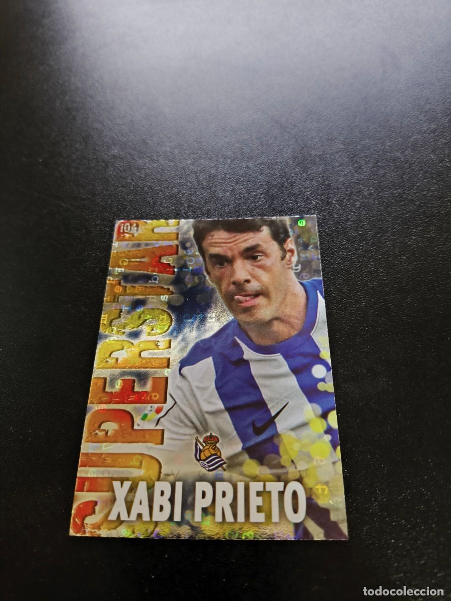 Cromos de Futebol: 104 XABI PRIETO SUPERSTAR FONDO LETRAS REAL SOCIEDAD MUNDICROMO LIGA 2013 2014 13 14 NO PANINI ESTE