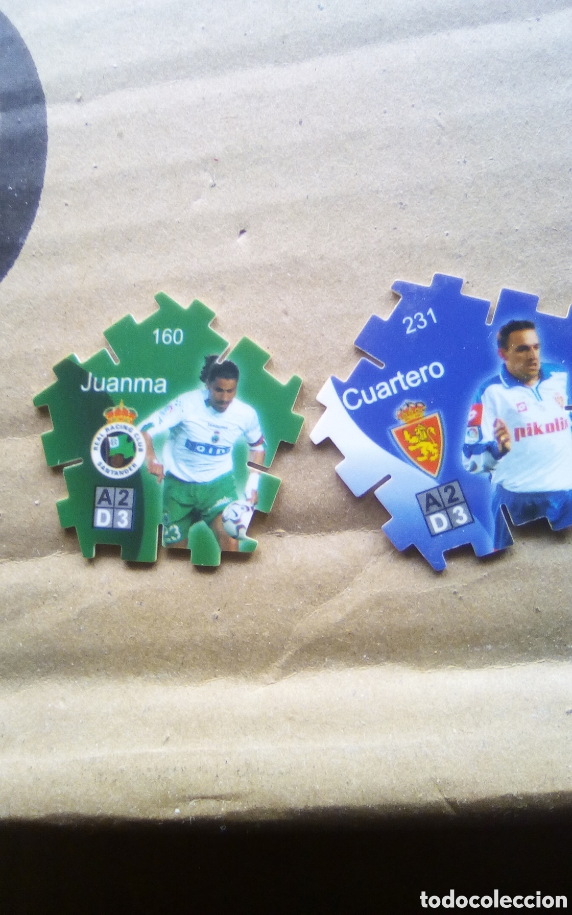 Cromos de F&uacute;tbol: Dos tazos Grefusa. 160 Juanma, del Santander. 231 Cuartero, del Zaragoza. Liga 2004-2005.