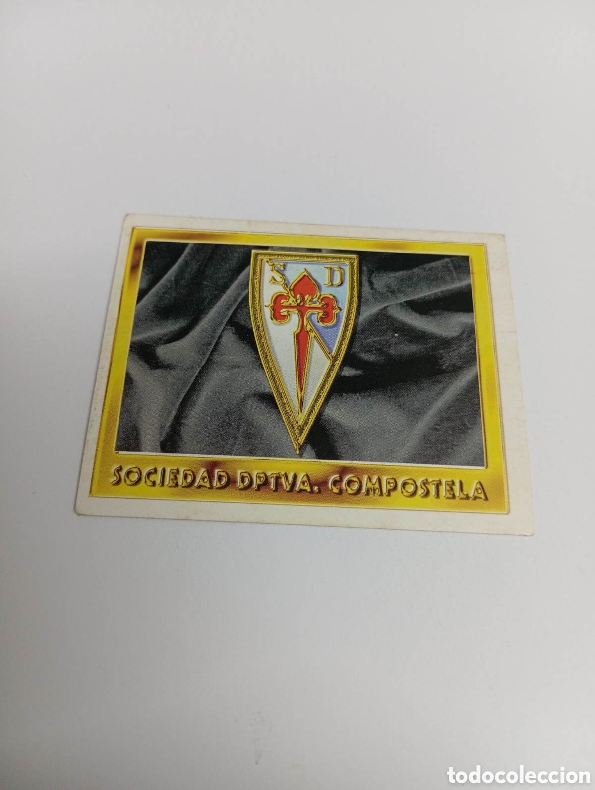 Cromos de F&uacute;tbol: ESCUDO Compostela Liga Este 1995 1996 NUEVO SIN PEGAR PANINI 95 96