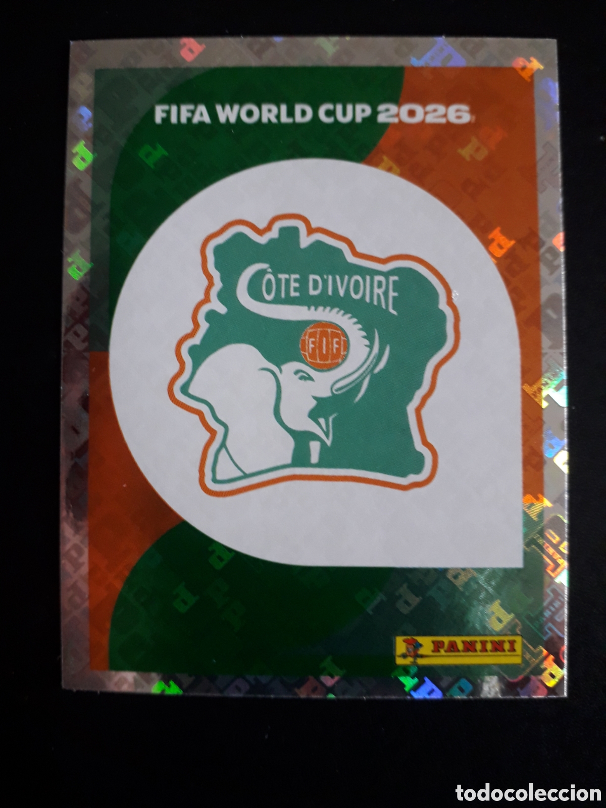 Cromos de F&uacute;tbol: ESCUDO COSTA DE MARFIL CIV 1 MUNDIAL F&Uacute;TBOL 2026 FIFA WORLD CUP PANINI SIN PEGAR PEDIDO M&Iacute;NIMO 3&euro;