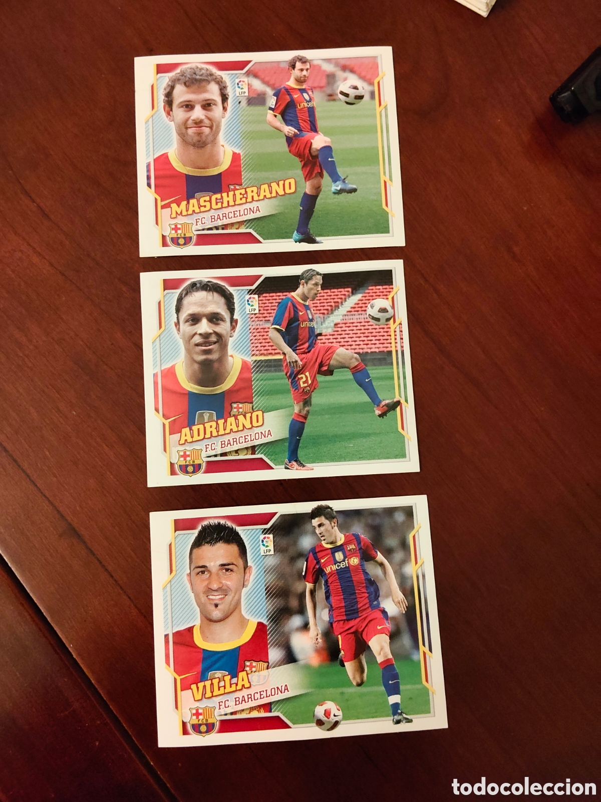 Cromos de F&uacute;tbol: Lote de 3 fichajes FC Barcelona Liga 2010-11 ediciones ESTE rookie David Villa Adriano Mascherano