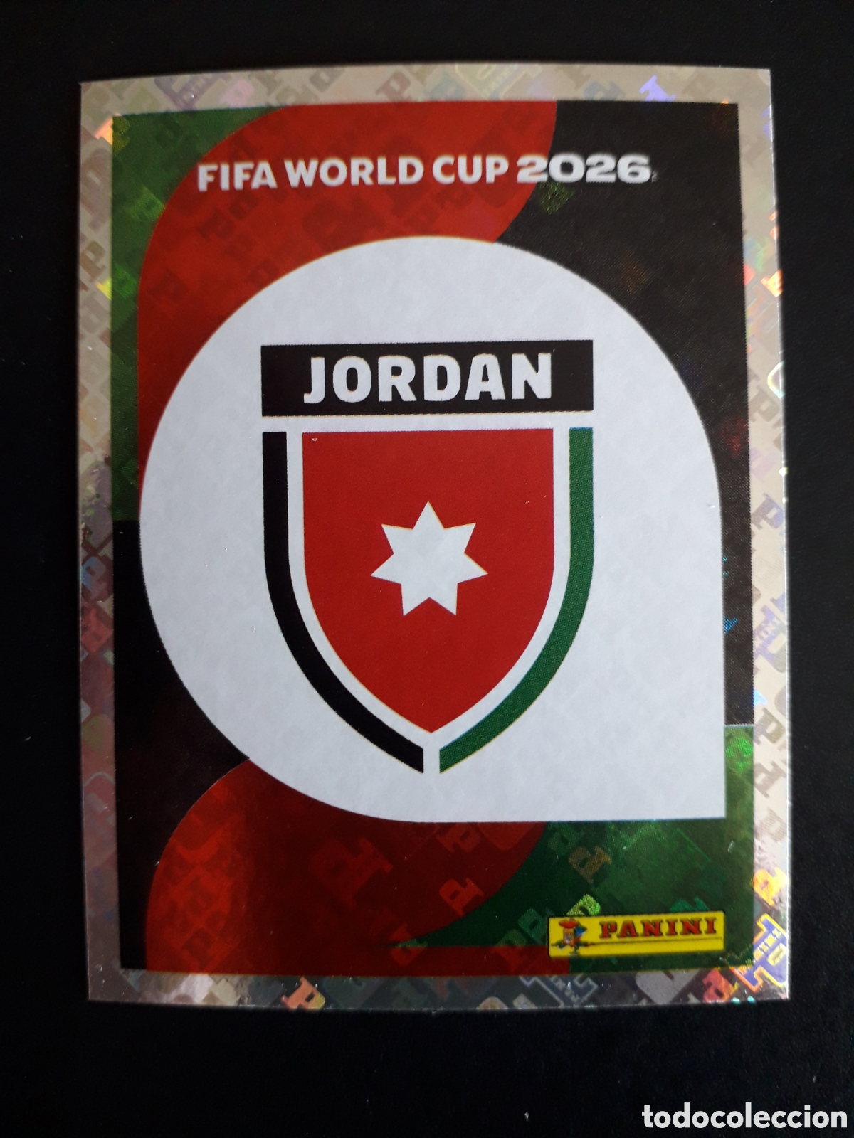 Cromos de F&uacute;tbol: ESCUDO JORDANIA JOR 1 MUNDIAL F&Uacute;TBOL 2026 FIFA WORLD CUP PANINI SIN PEGAR PEDIDO M&Iacute;NIMO 3&euro;