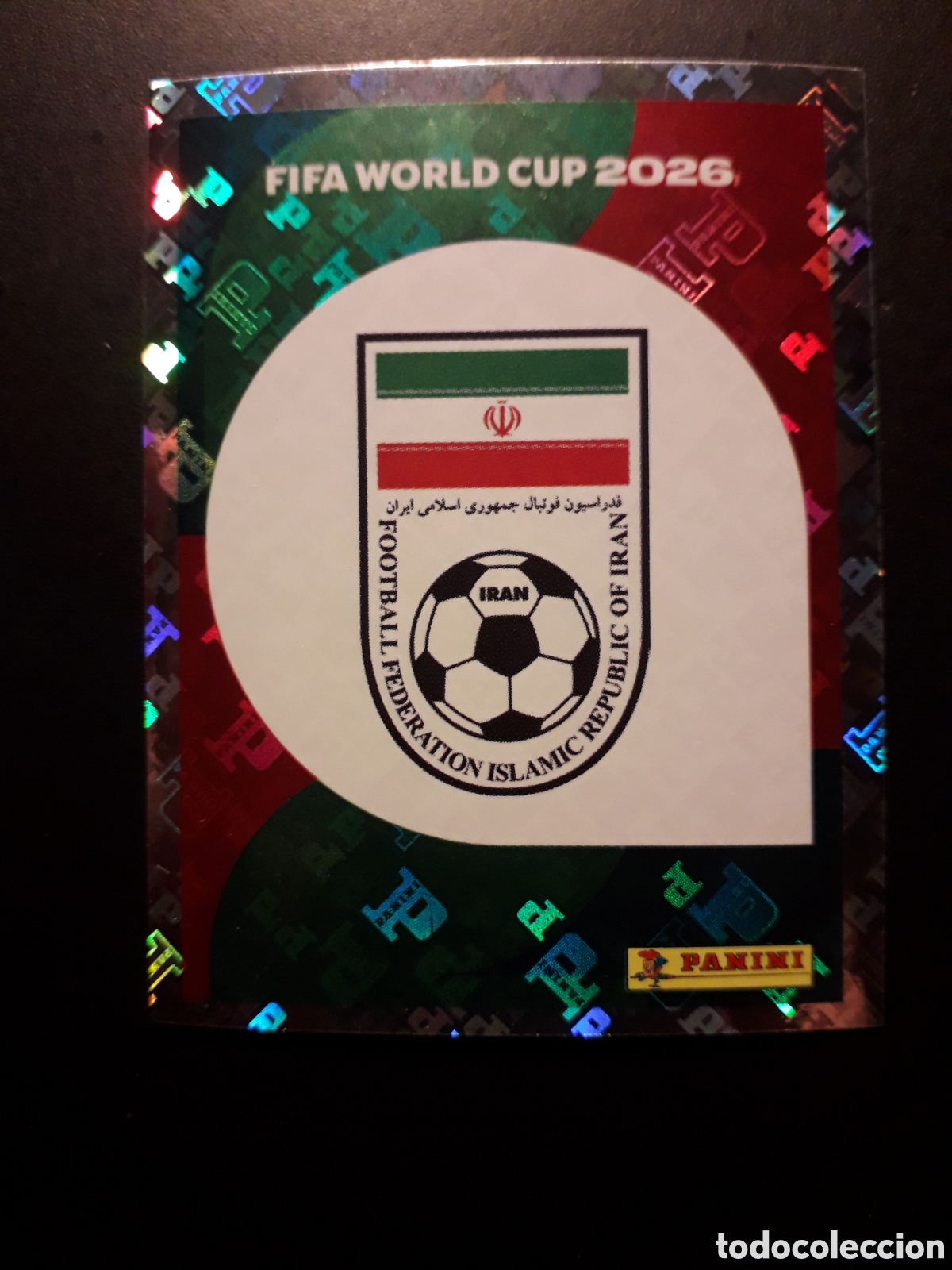 Cromos de F&uacute;tbol: ESCUDO IR&Aacute;N IRN 1 MUNDIAL F&Uacute;TBOL 2026 FIFA WORLD CUP PANINI SIN PEGAR PEDIDO M&Iacute;NIMO 3&euro;