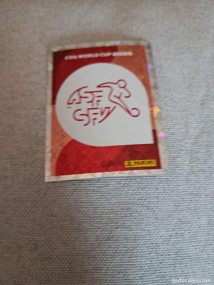 Cromos de F&uacute;tbol: Panini Mundial 2026 Estados Unidos-Mexico. 1- Escudo. Suiza. Nunca pegado.