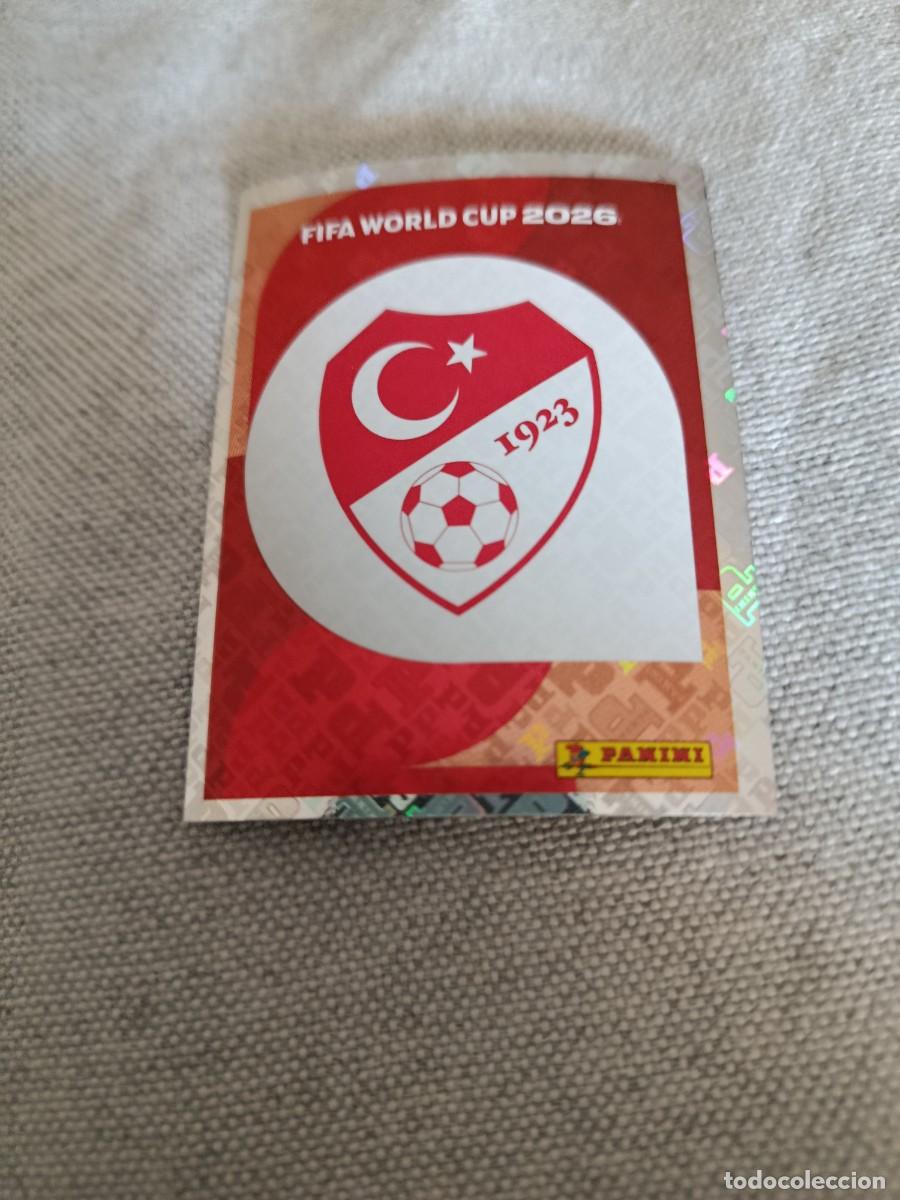 Cromos de F&uacute;tbol: Panini Mundial 2026 Estados Unidos-Mexico. 1- Escudo. Turqu&iacute;a. Nunca pegado.