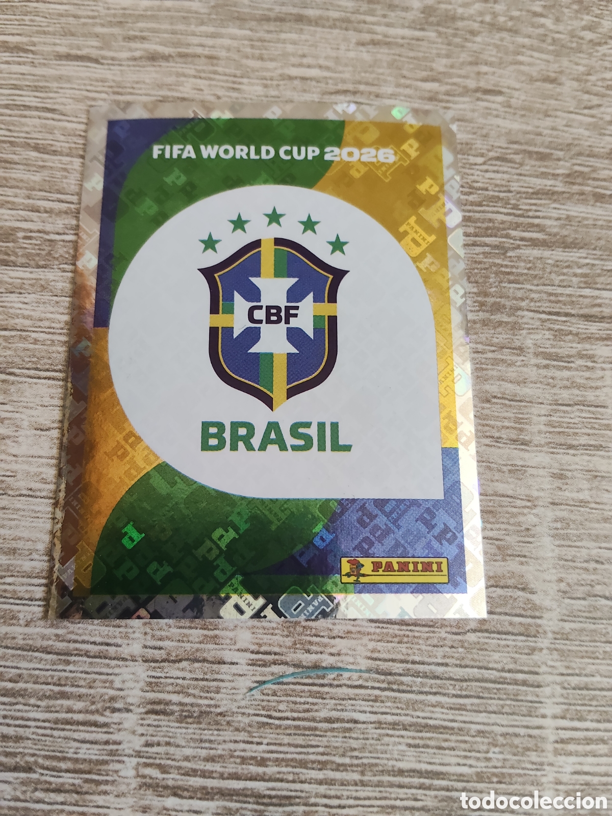 Cromos de F&uacute;tbol: Panini mundial 2026 BRA 1 escudo Brasil