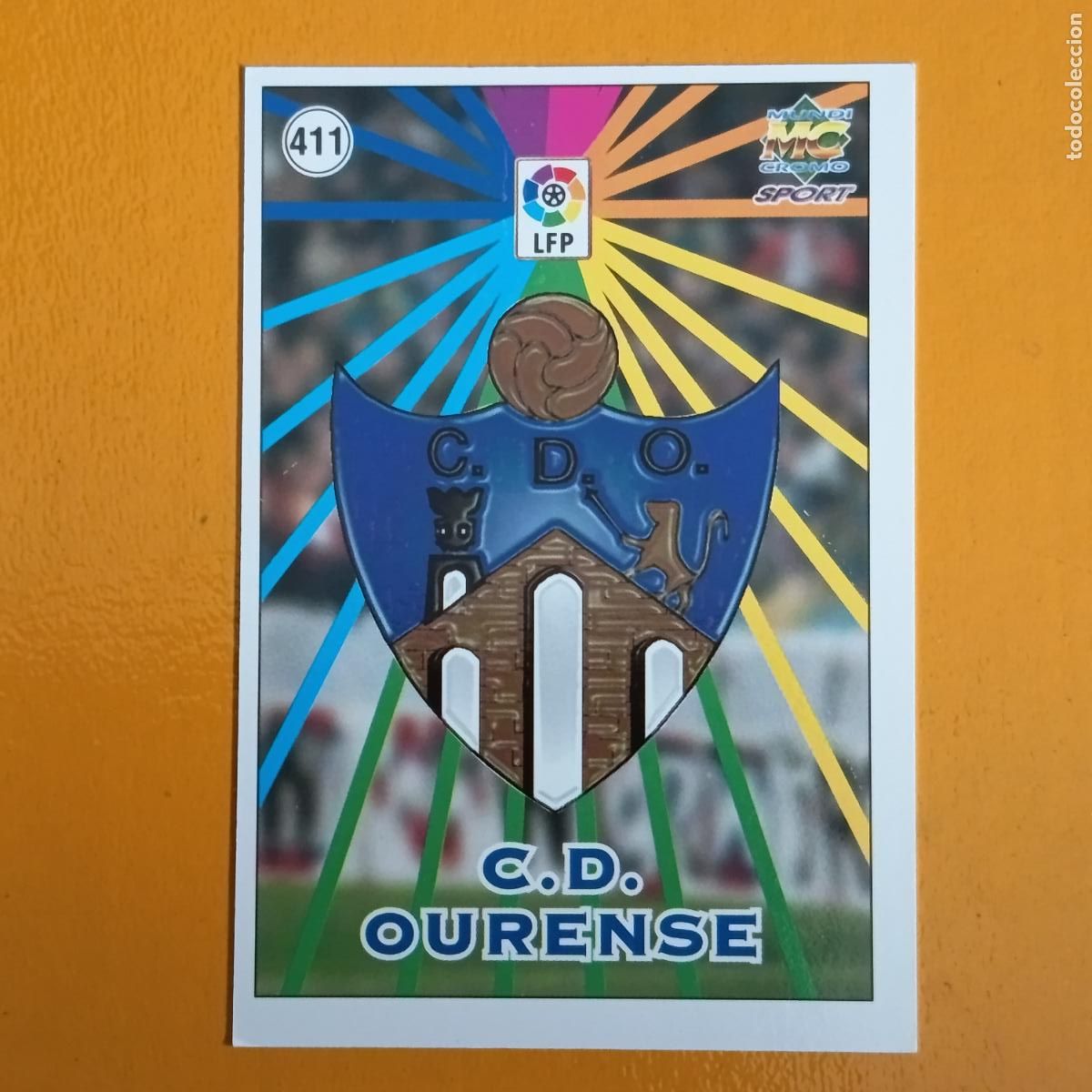 Cartes &agrave; collectionner de Football: 411 ESCUDO/PLANTILLA. C.D. OURENSE. LAS FICHAS DE LA LIGA 98-99. MUNDICROMO