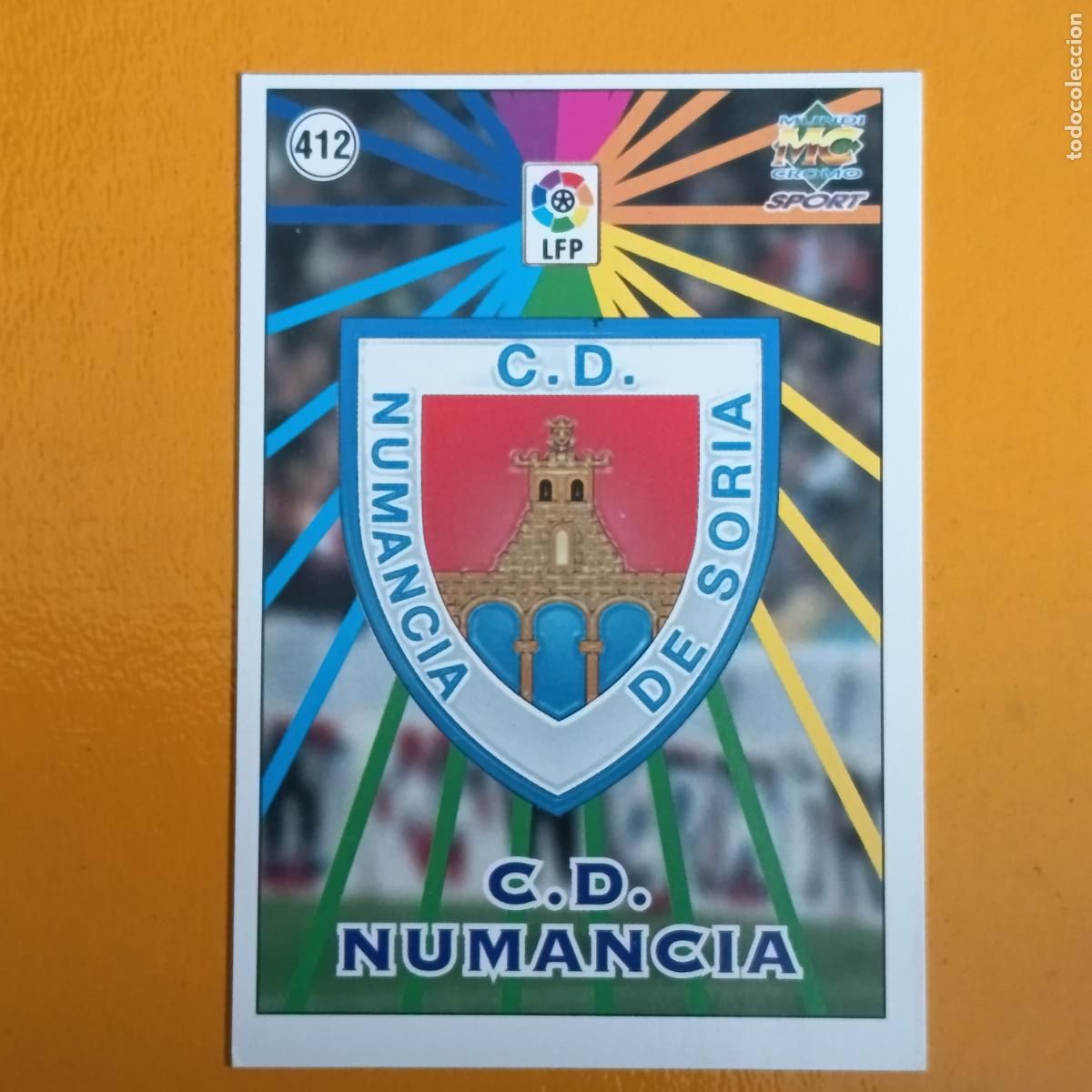 Cartes &agrave; collectionner de Football: 412 ESCUDO/PLANTILLA. C.D. NUMANCIA. LAS FICHAS DE LA LIGA 98-99. MUNDICROMO
