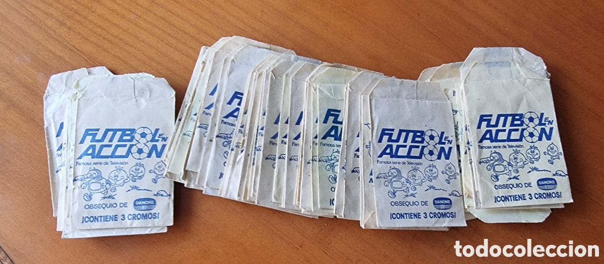 Cromos de F&uacute;tbol: Lote 58 sobres vac&iacute;os F&uacute;tbol en acci&oacute;n Danone 1982 Naranjito