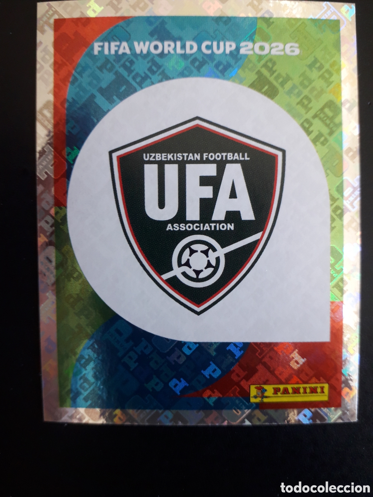 Cromos de F&uacute;tbol: ESCUDO UZB 1 MUNDIAL F&Uacute;TBOL 2026 FIFA WORLD CUP PANINI SIN PEGAR PEDIDO M&Iacute;NIMO 3&euro;