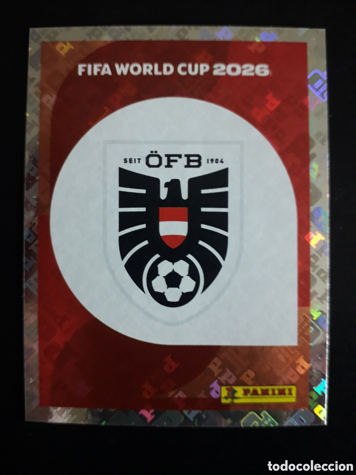 Cromos de F&uacute;tbol: ESCUDO AUSTRIA AUT 1 MUNDIAL F&Uacute;TBOL 2026 FIFA WORLD CUP PANINI SIN PEGAR PEDIDO M&Iacute;NIMO 3&euro;