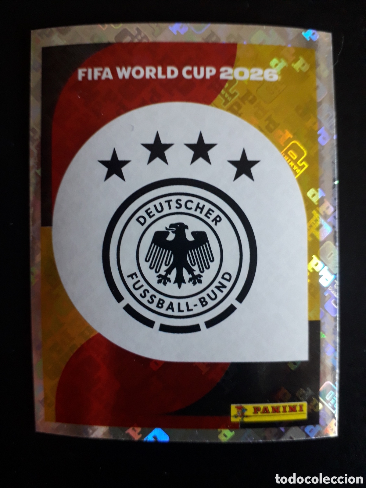 Cromos de F&uacute;tbol: ESCUDO ALEMANIA GER 1 MUNDIAL F&Uacute;TBOL 2026 FIFA WORLD CUP PANINI SIN PEGAR PEDIDO M&Iacute;NIMO 3&euro;