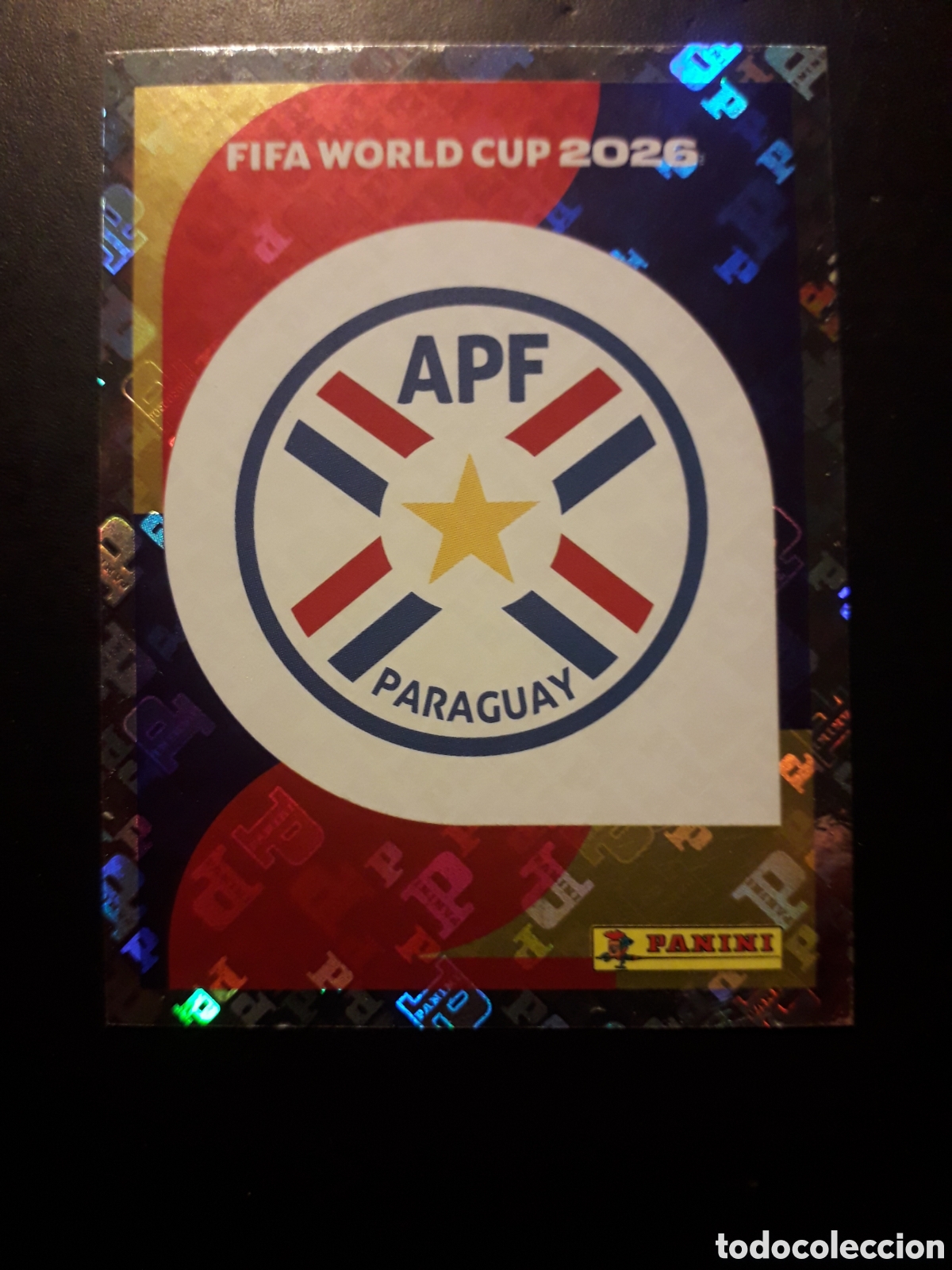 Cromos de F&uacute;tbol: ESCUDO PARAGUAY PAR 1 MUNDIAL F&Uacute;TBOL 2026 FIFA WORLD CUP PANINI SIN PEGAR PEDIDO M&Iacute;NIMO 3&euro;