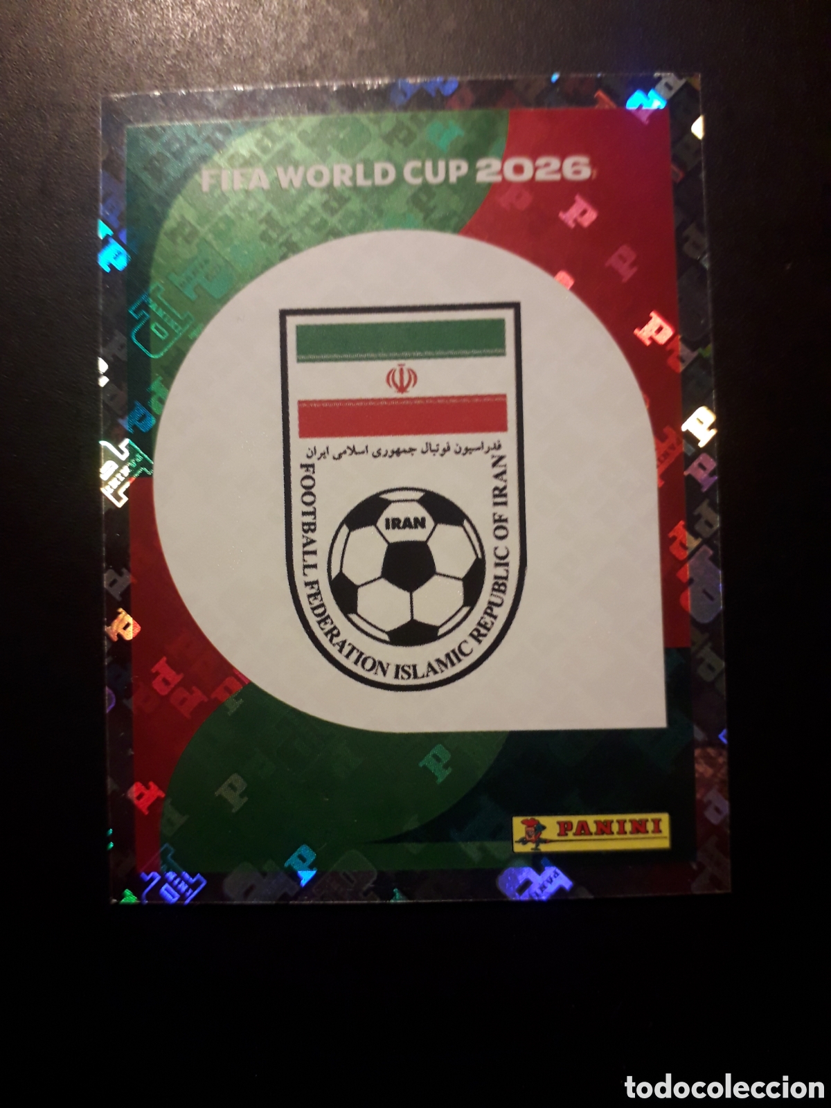 Cromos de F&uacute;tbol: ESCUDO IR&Aacute;N IRN 1 MUNDIAL F&Uacute;TBOL 2026 FIFA WORLD CUP PANINI SIN PEGAR PEDIDO M&Iacute;NIMO 3&euro;