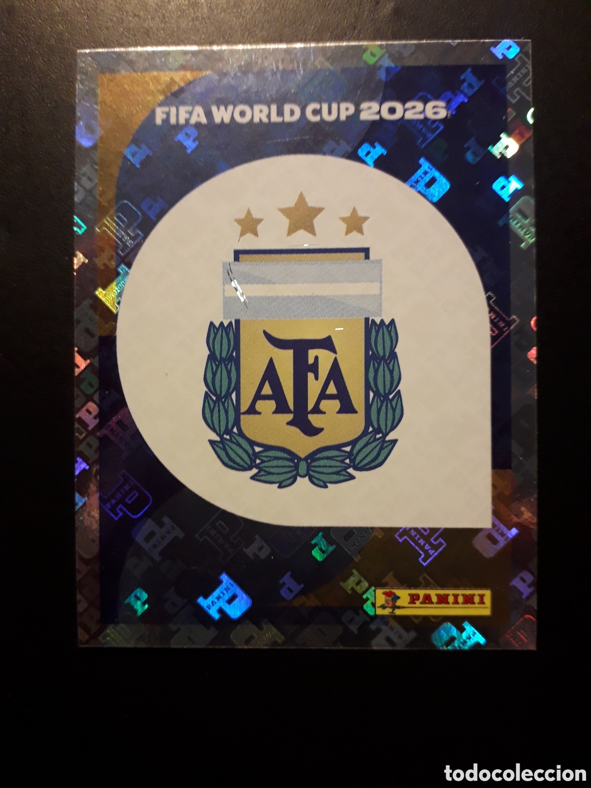 Cromos de F&uacute;tbol: ESCUDO ARGENTINA ARG 1 MUNDIAL F&Uacute;TBOL 2026 FIFA WORLD CUP PANINI SIN PEGAR PEDIDO M&Iacute;NIMO 3&euro;