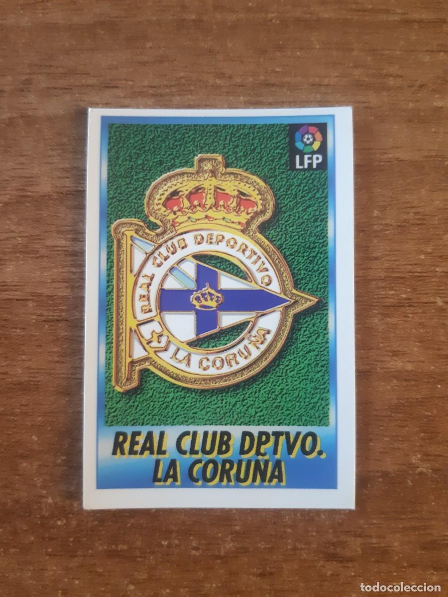 Cromos de F&uacute;tbol: N&deg;66 Escudo Deportivo Coru&ntilde;a Liga 96-97 BOLLYCAO. Trasera Sigue La Liga. Nunca pegado, sin pegar