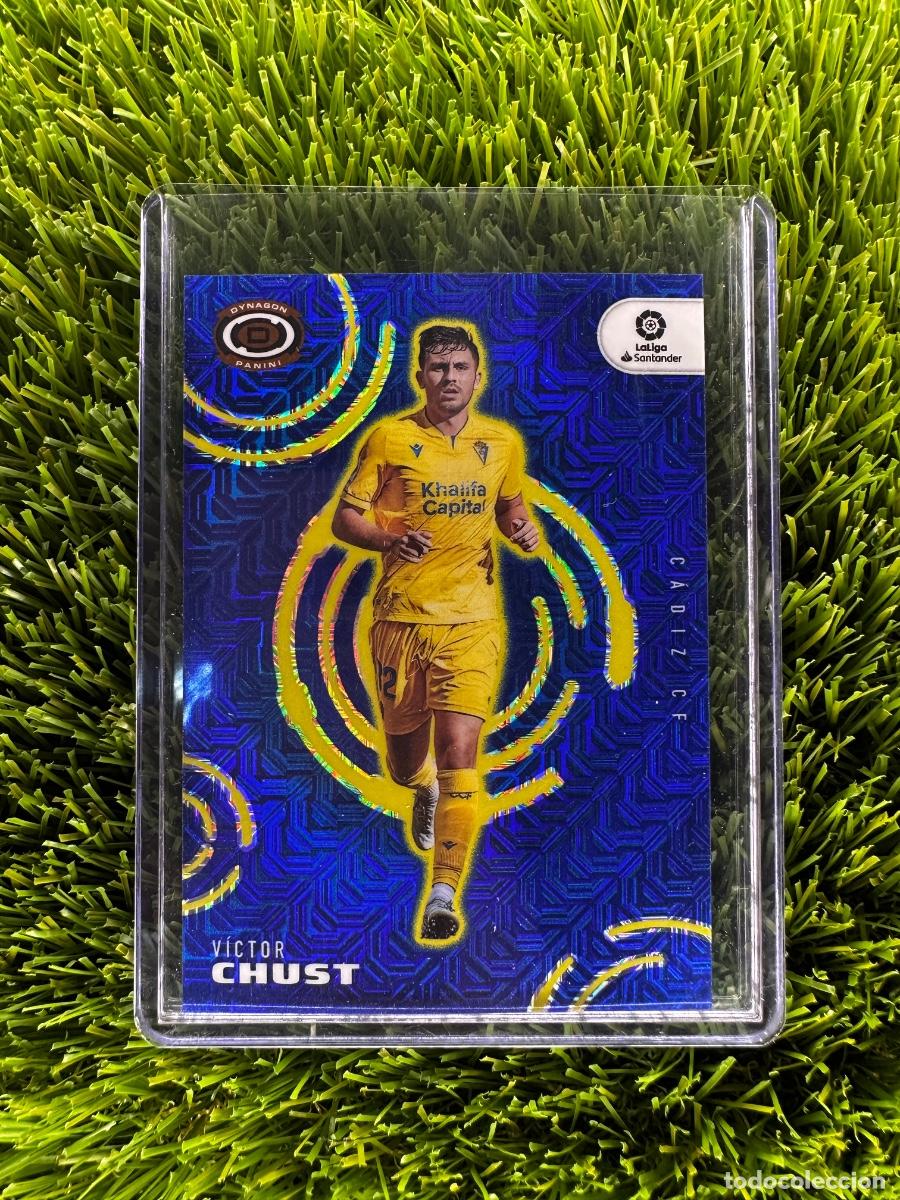 Cromos de F&uacute;tbol: N&ordm; 263 V&iacute;ctor Chust Dynagon Blue Mojo Numerado 6/16 C&aacute;diz CF Panini Chronicles La Liga 22 23